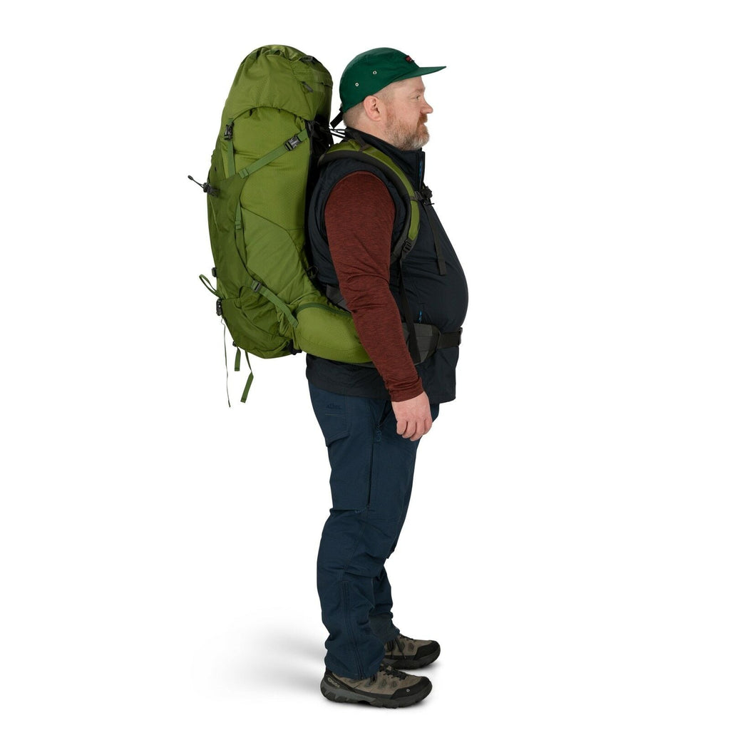 a person modeling the Aether™ 65 Extended Fit in color garlicmustardgreen