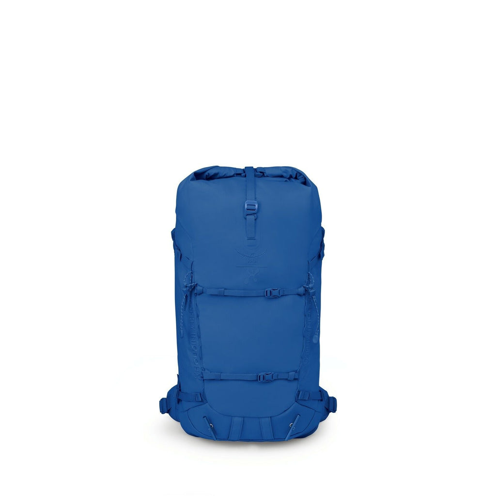 The images depict a blue backpack that features a streamlined and robust design. It has a roll-top closure, providing flexibility in expanding the storage capacity and ensuring secure containment of items inside. The backpack includes various straps and b