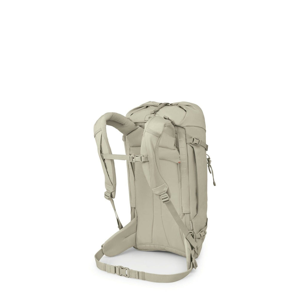 The image depicts a beige backpack with a clean, minimalist design. It features adjustable shoulder straps and a chest strap for added support and comfort. The backpack has multiple compartments and zippers, providing ample storage space. The material app