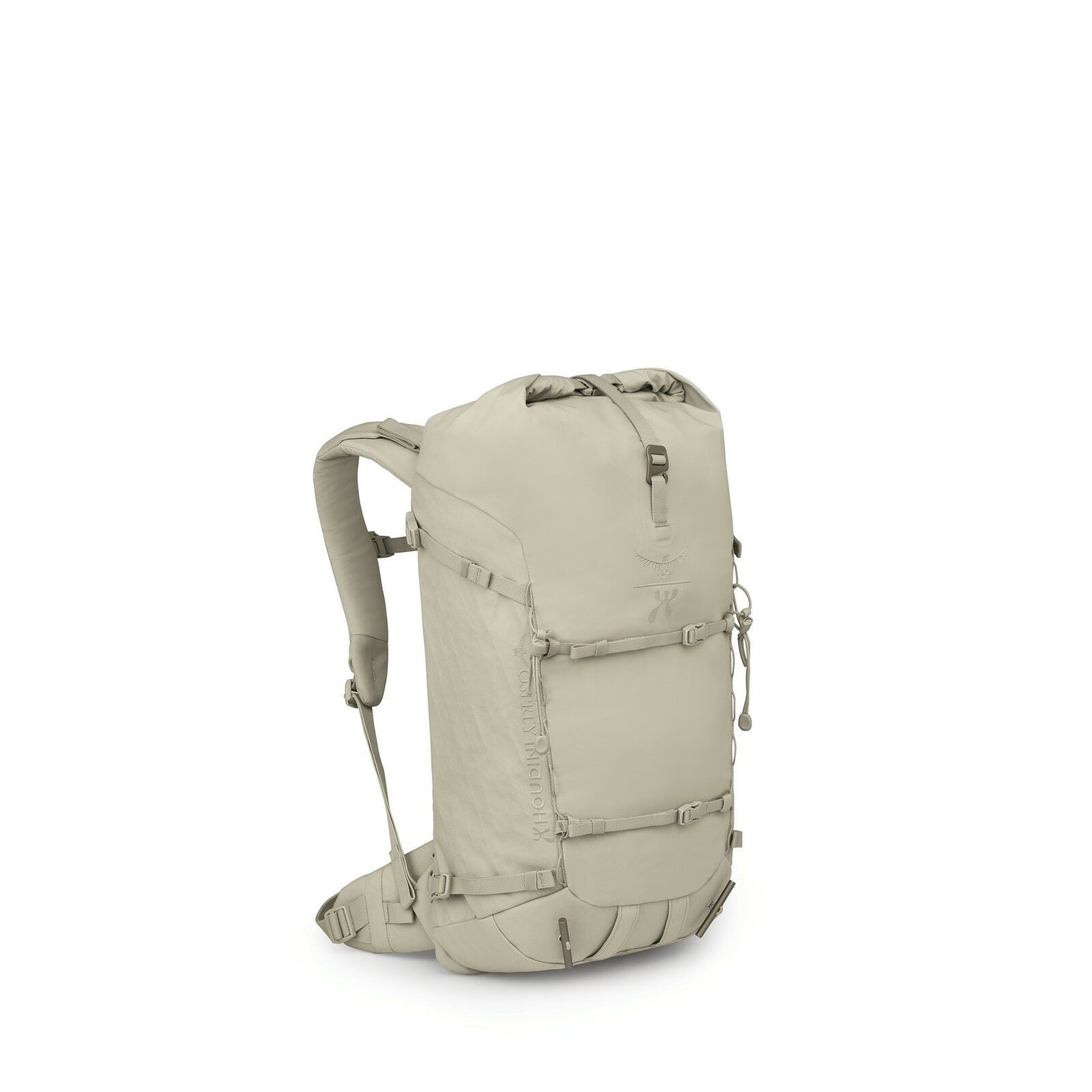 The image features a khaki-colored hiking backpack with a sleek and compact design. The bag has a roll-top closure and multiple straps and buckles for securing and adjusting the load. There are two visible side pockets, likely for storing water bottles or