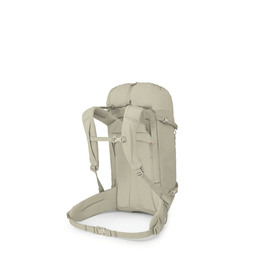 The image features a backpack designed for hiking or outdoor activities. It has a streamlined shape with a large main compartment and several adjustable straps to secure the load. The backpack is beige in color, giving it a neutral, understated appearance