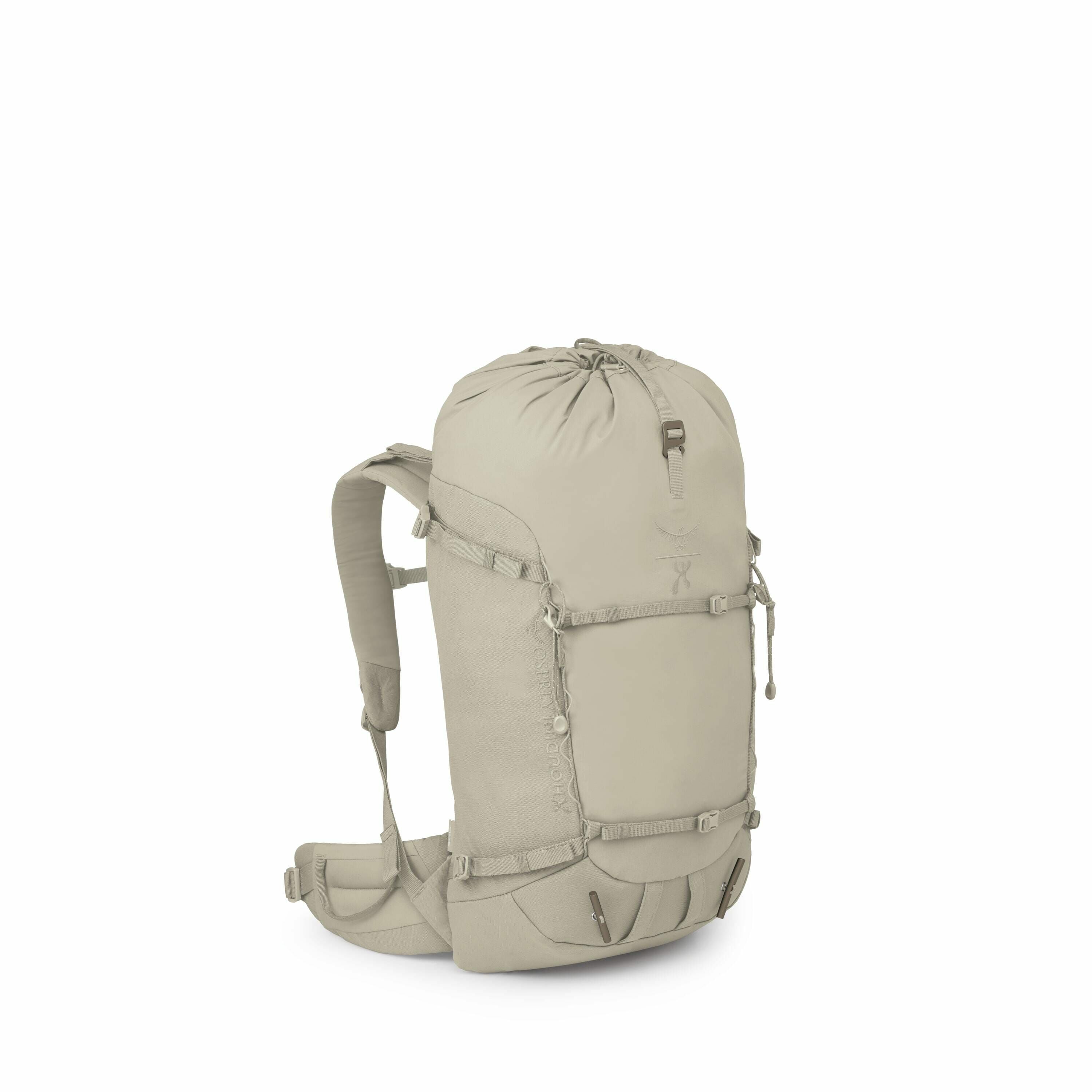 The image shows a light gray backpack with a simple and functional design. It features a large main compartment accessible from the top, secured with a drawstring and a buckle. The backpack has two adjustable shoulder straps and a padded hip belt for comf