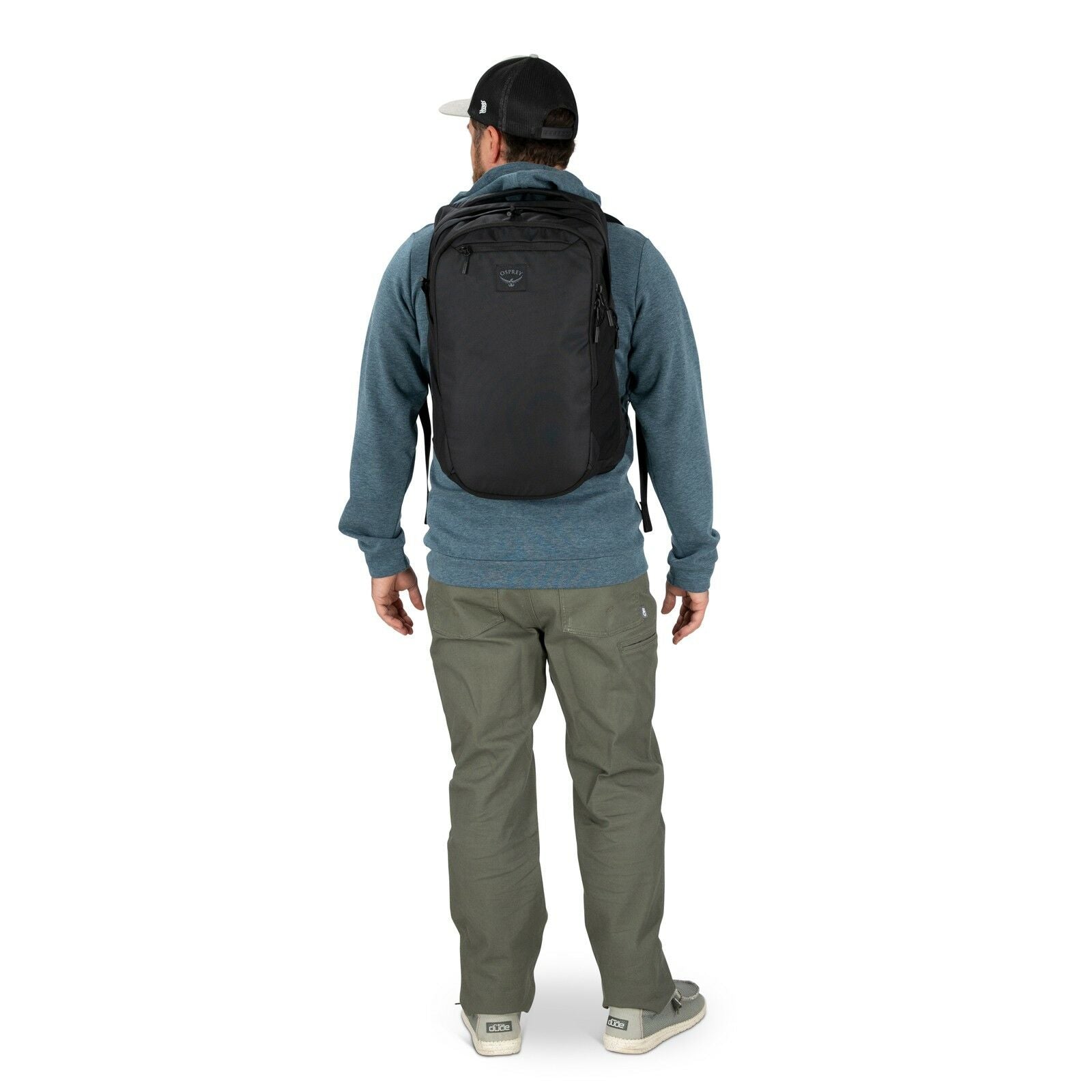 a person modeling the Aoede Airspeed Backpack  in color Black
