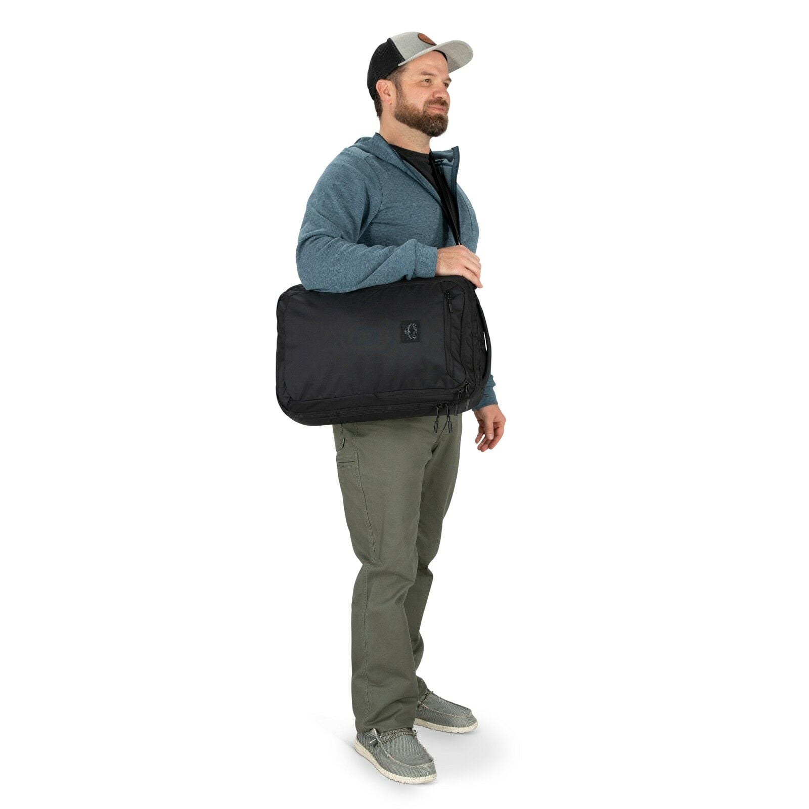 a person modeling the Aoede Briefpack  in color Black