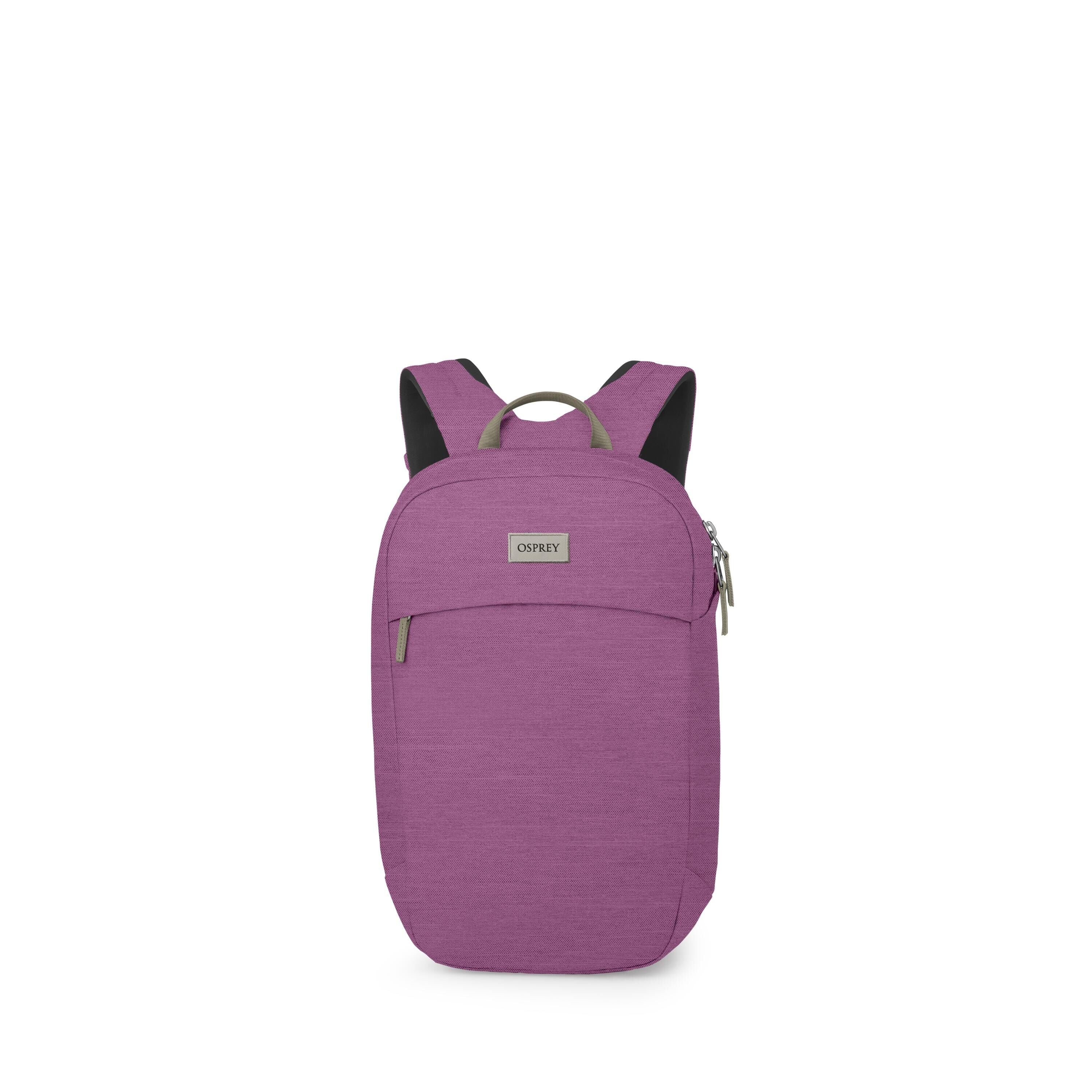 A compact Osprey backpack is shown in a vibrant purple color. It has a clean, rounded silhouette with a small front zip pocket and a main zippered compartment. Padded shoulder straps and a short top handle are visible, with contrasting olive accents on th