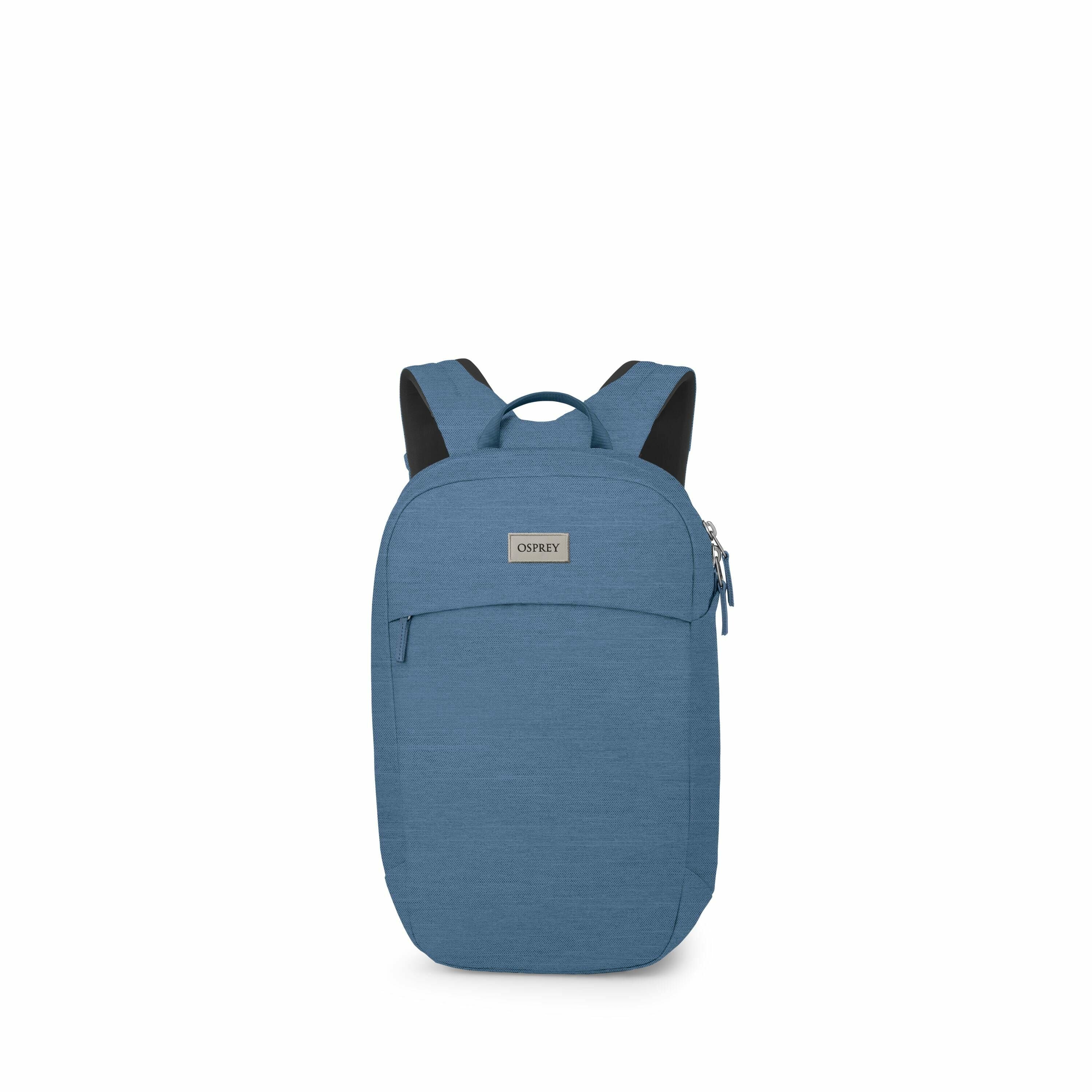 The image shows a blue Osprey backpack viewed from the front. The backpack features a simple and sleek design with a main compartment that has a zipper closure on the side. It has a small front pocket and a handle at the top for carrying. The shoulder str