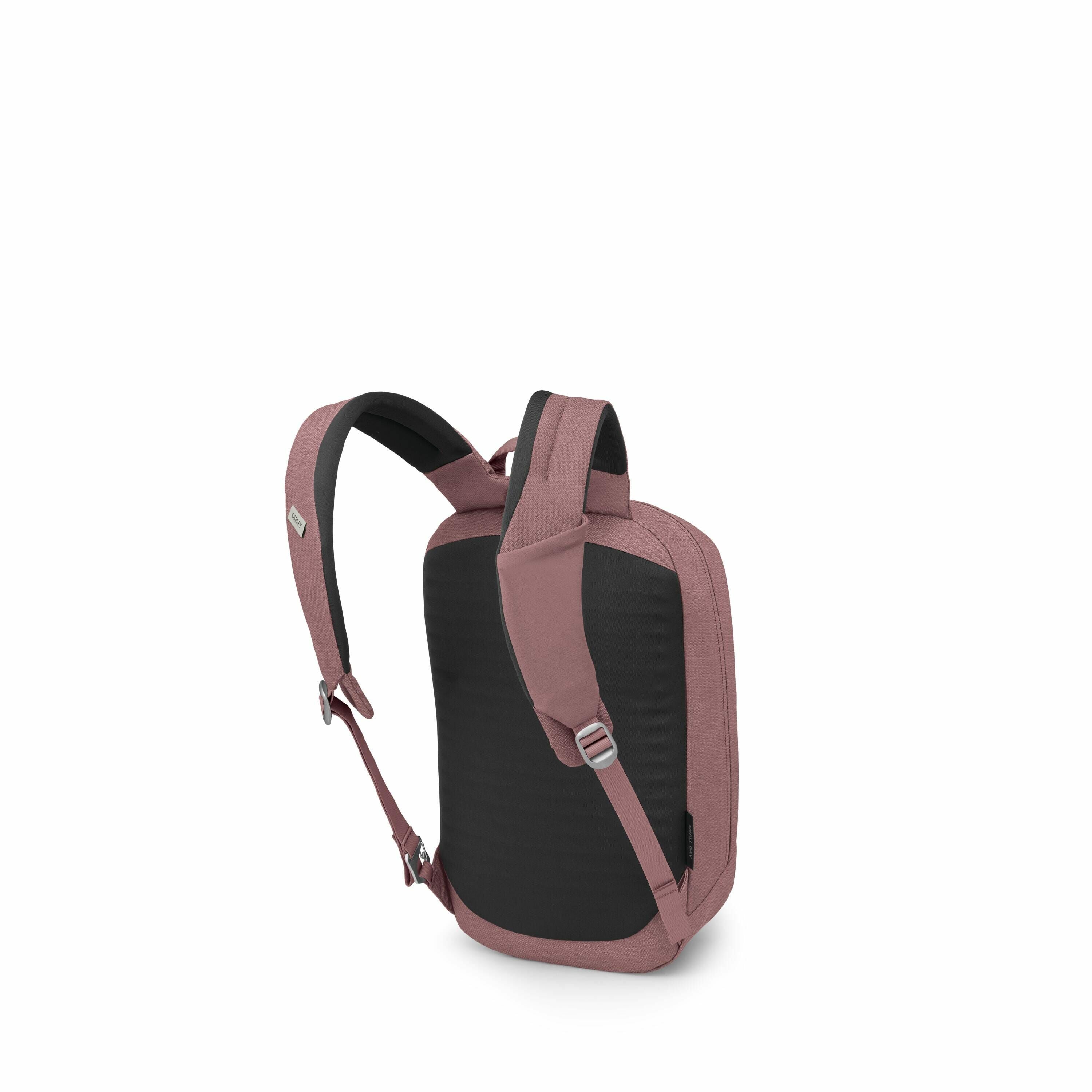 The image depicts a backpack with a modern design, shown from a slightly elevated rear angle. It features a sleek combination of colors, with the main body of the bag in a dark black and the surrounding fabric in a muted mauve pink. The backpack straps ar