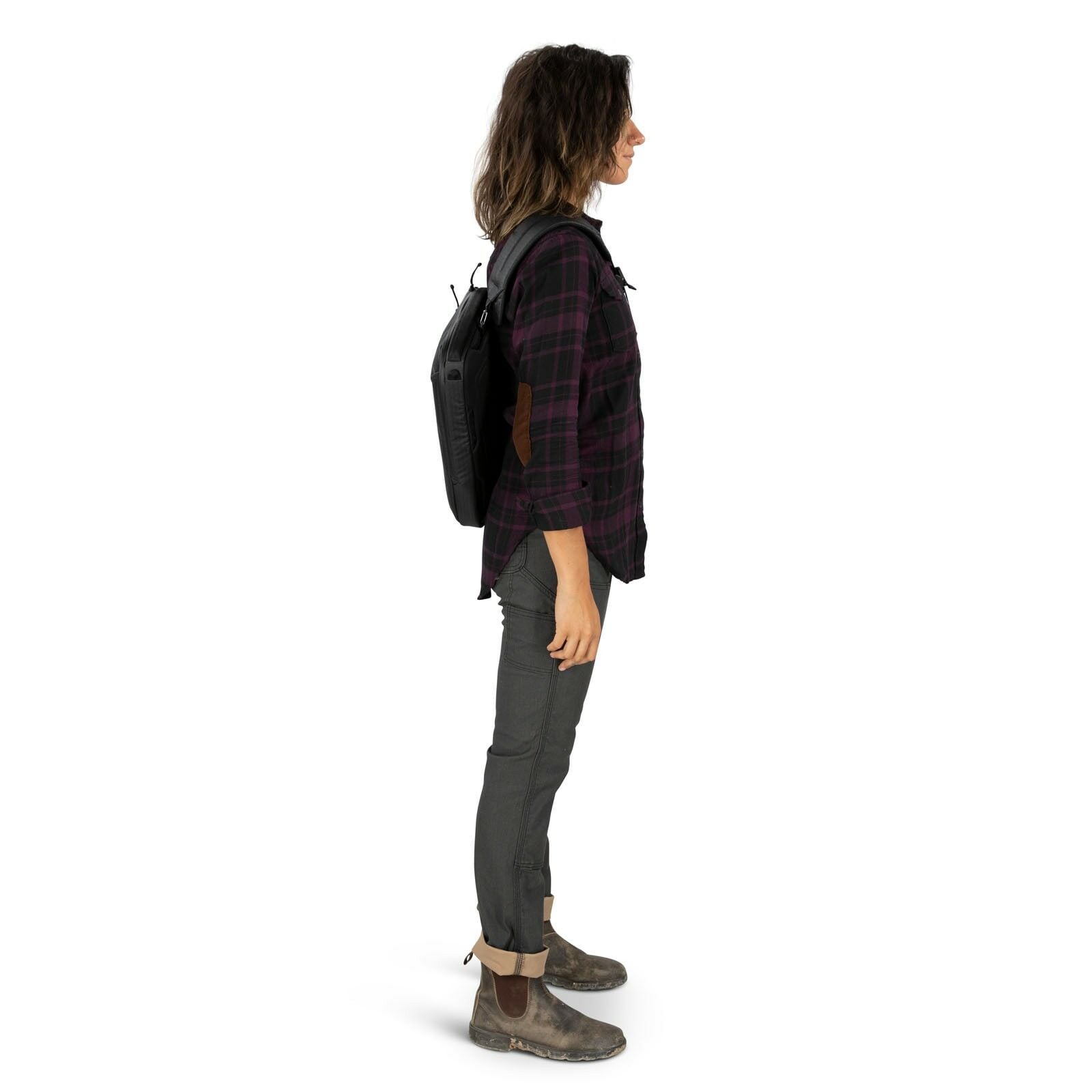 side view of person wearing the archeon sling in color black
