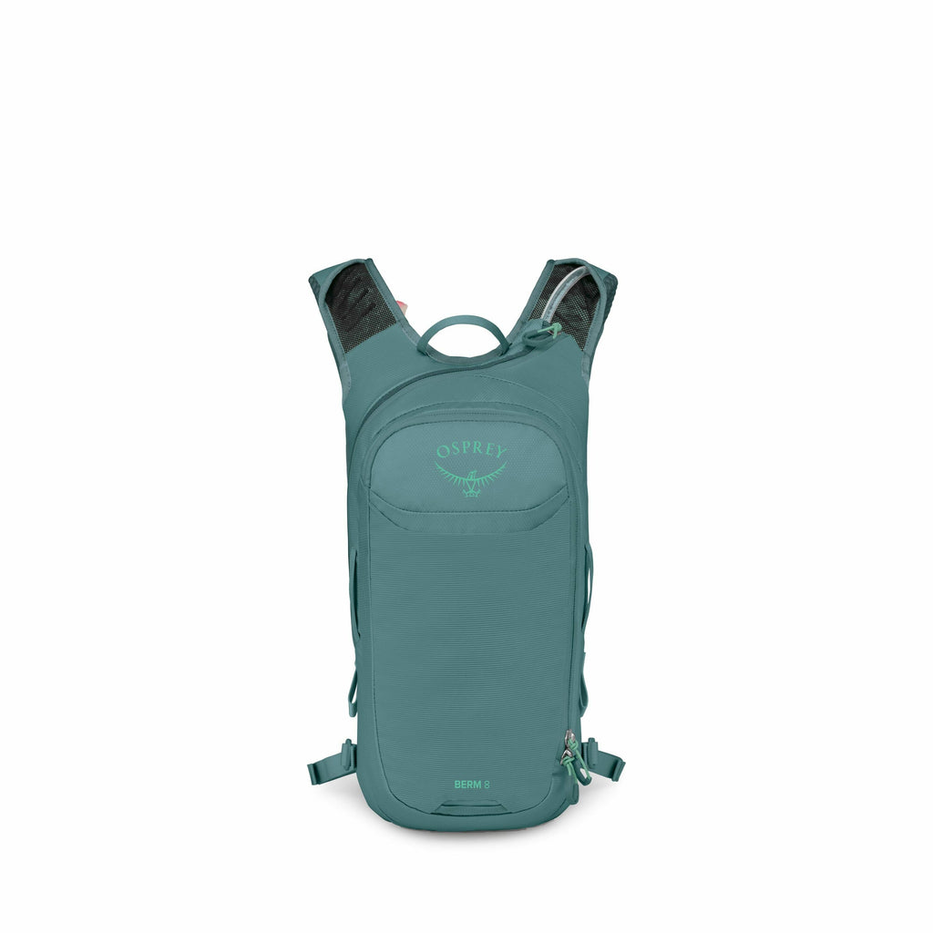 The image shows a teal-colored Osprey backpack, viewed from the front. It has a sleek and compact design with minimal compartments visible from this angle. The Osprey logo is prominently displayed on the upper front section of the backpack, and the model