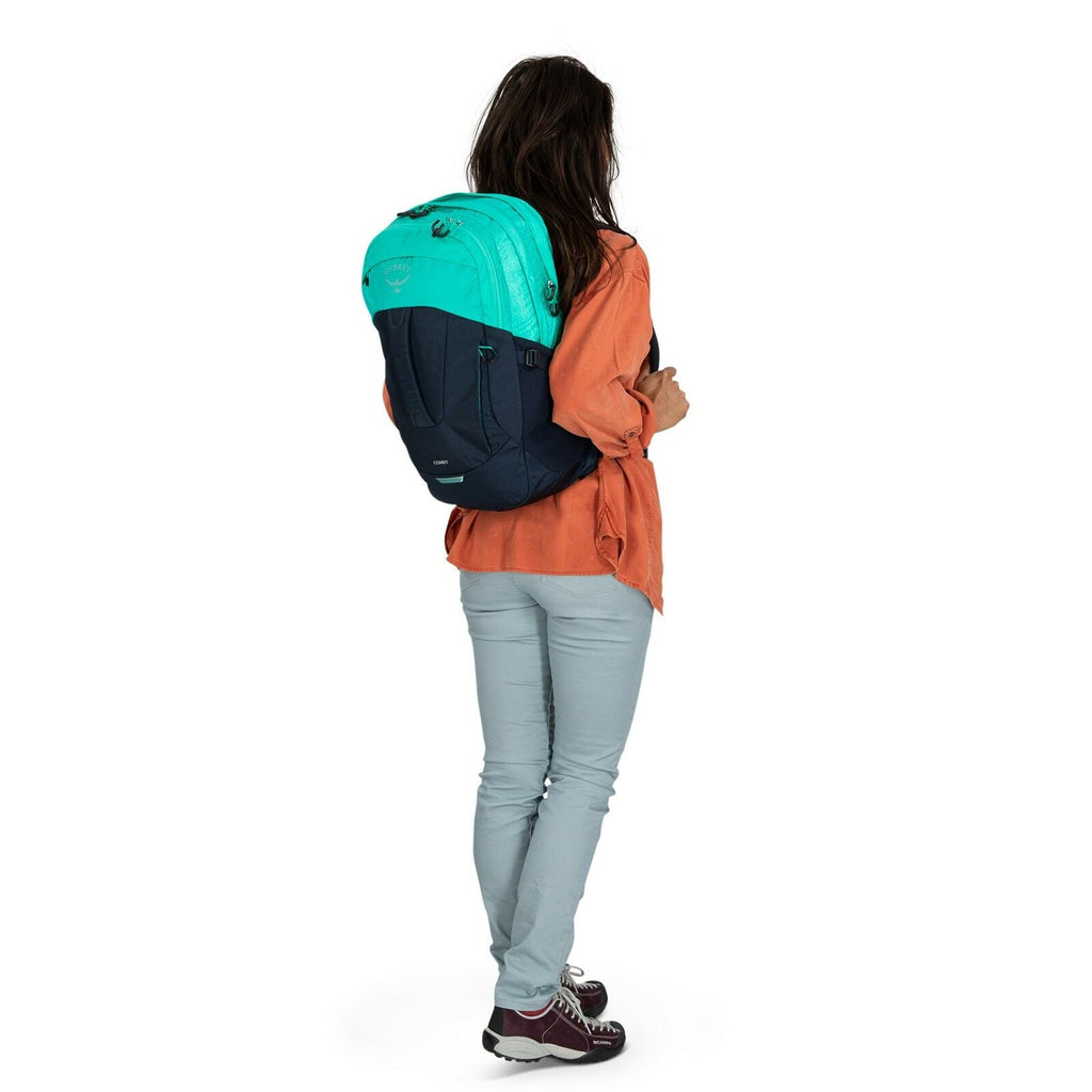 a person modeling the Comet 30 in color reveriegreencetaceanblue