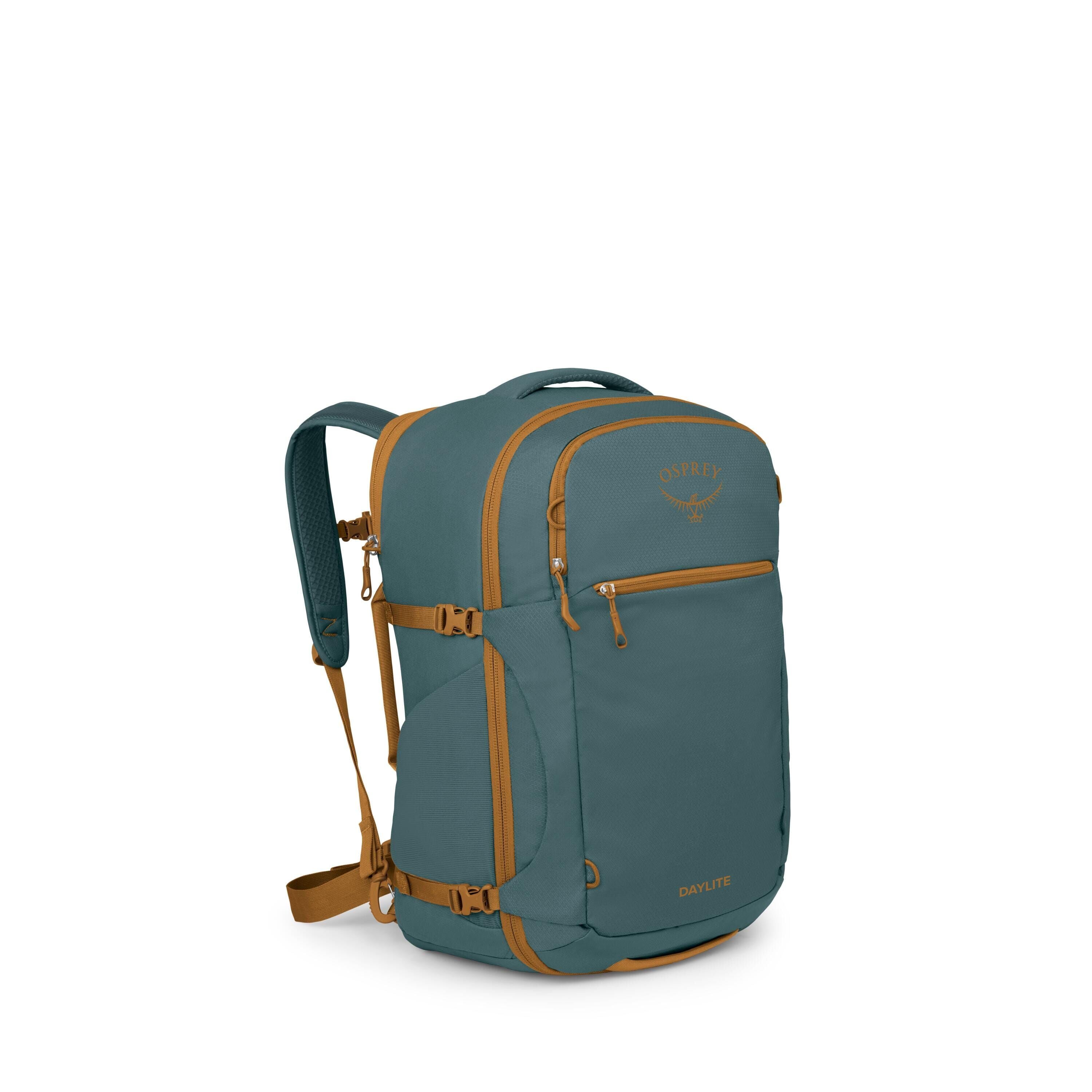 The image shows a teal and mustard-colored Osprey Daylite travel backpack. It has multiple zippered compartments, compression straps on the sides, and a front pocket with a small zipper. The shoulder straps and hip belt are padded, and there's a top carry