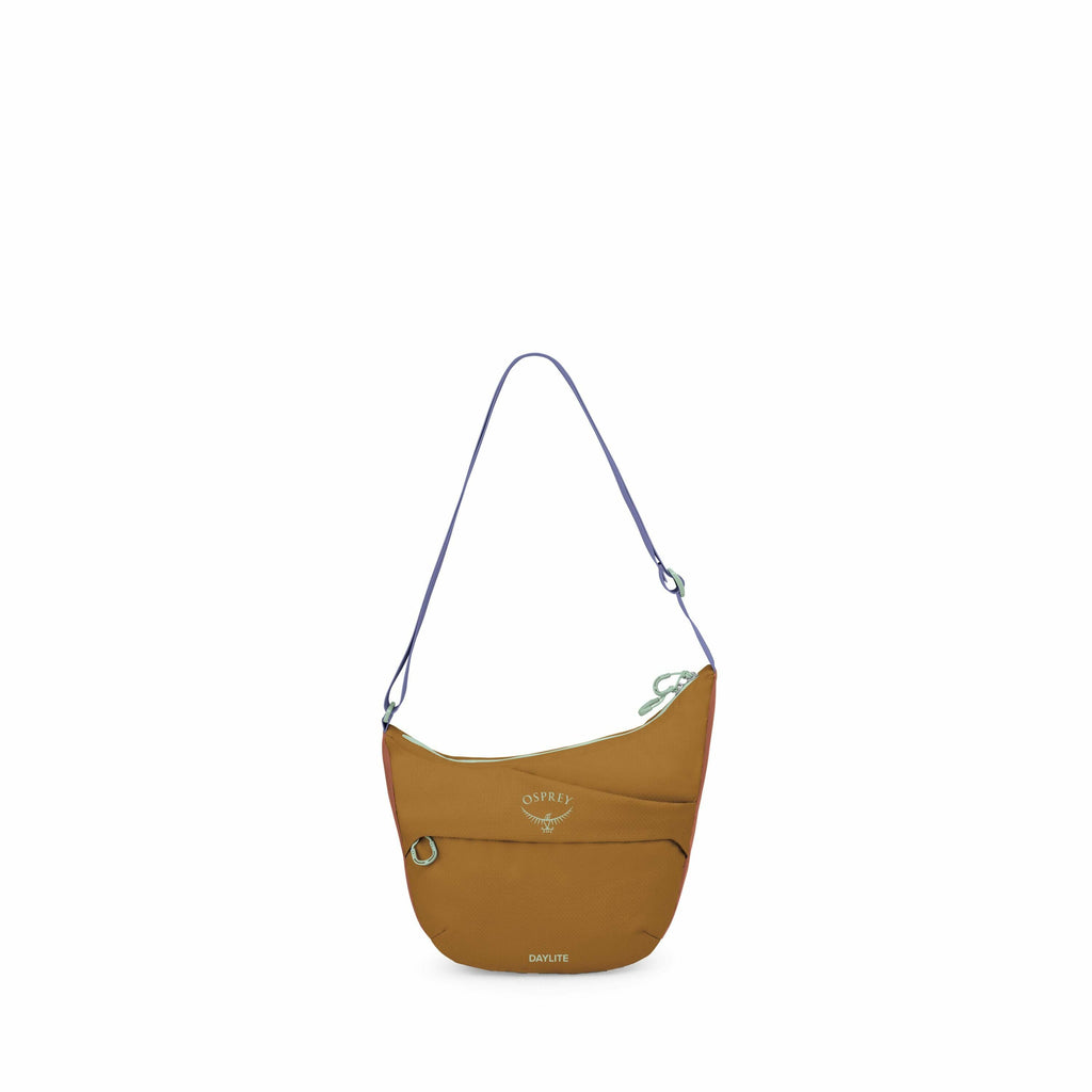 The image displays a brown, teardrop-shaped crossbody bag with a long, adjustable purple strap. The bag features two visible logos; one is "OSPREY" along with its emblem, and the other is the word "DAYLITE" at the bottom. The main compartment is secured w