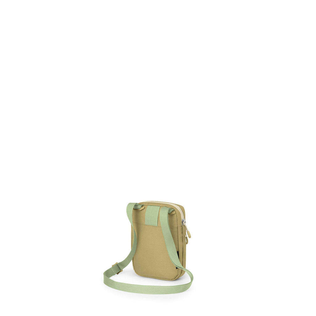 The images show a small crossbody sling bag in a muted olive green with light mint straps. It has a rectangular shape with rounded corners and a zippered main compartment. The adjustable shoulder strap attaches with metal rings, and there's a belt loop pa