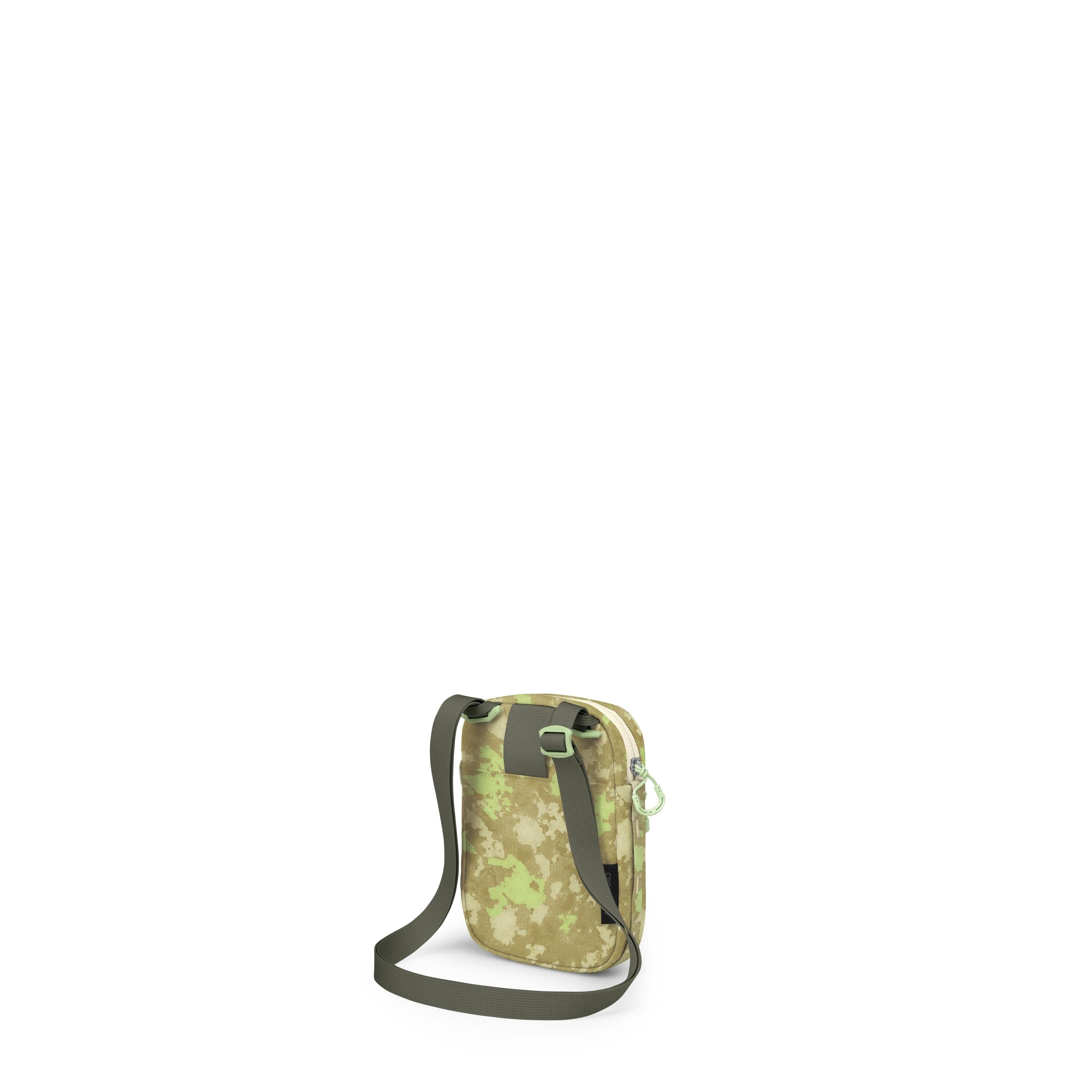 A small crossbody bag with a green digital-camouflage pattern is shown against a white background. It has a dark green adjustable shoulder strap with plastic buckles and a zipper pull in bright green. The bag is compact and rectangular with rounded corner