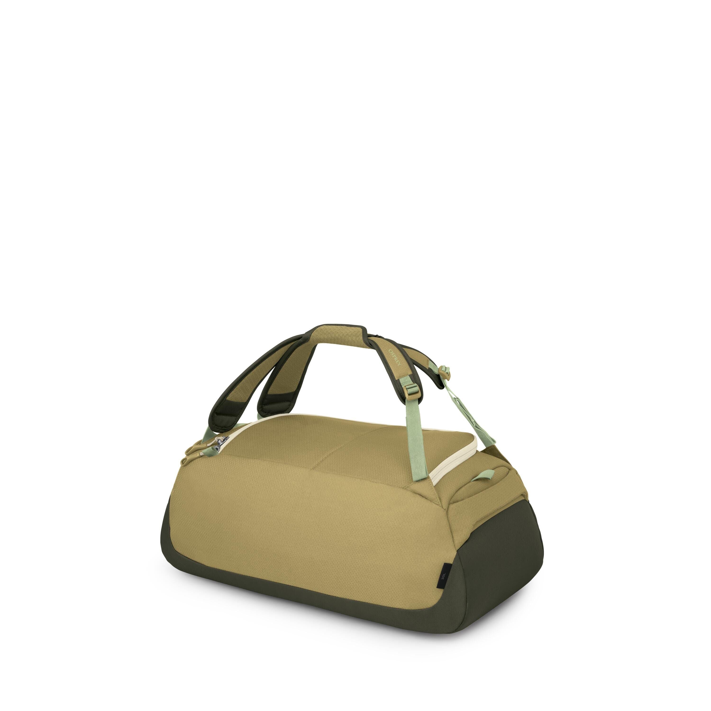 A compact duffel bag is shown from a front-side angle on a white background. The bag features a two-tone green color scheme with a lighter olive body and darker forest panels on the base and ends. It has padded grab handles, adjustable side straps with bu