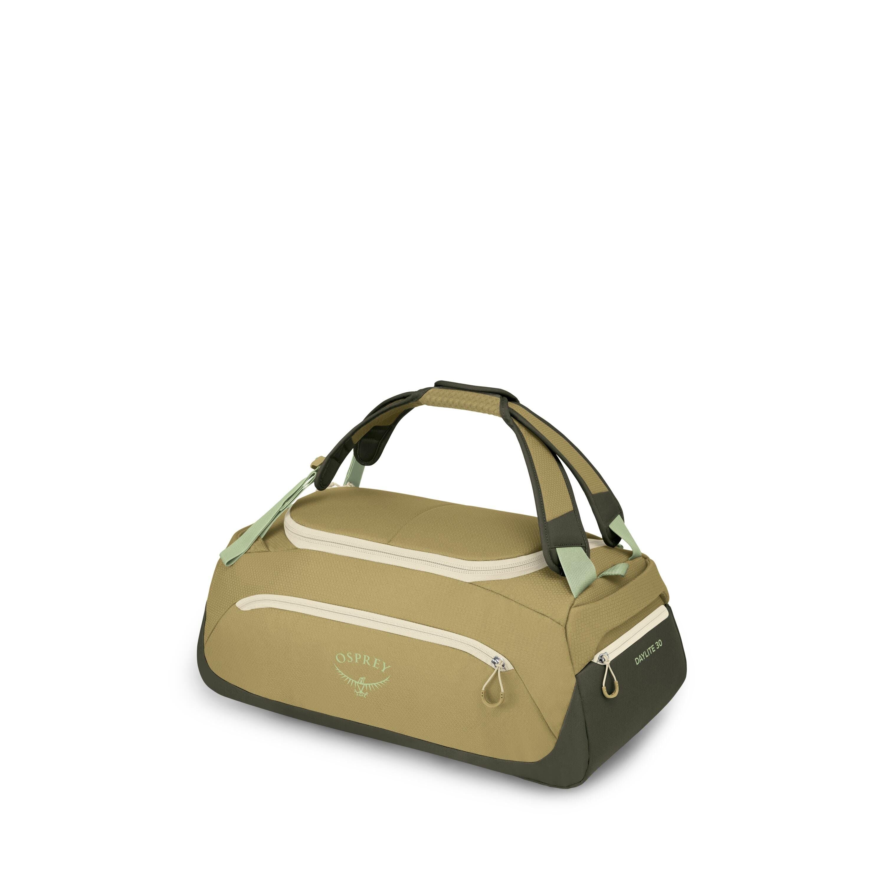 A compact duffel bag in olive and dark green tones is shown from several angles and in exploded views of its components. The bag has double carry handles with a padded wrap, zippered top access, and front and side pockets with light-colored zippers. "OSPR