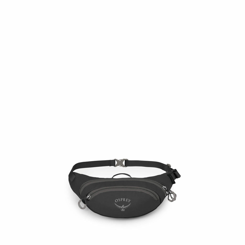The image displays a dark gray Osprey fanny pack, also known as a waist pack or belt bag. The pack has a simple, sleek design with a main zippered compartment that bears the Osprey logo prominently on the front. The bag features adjustable straps with a b