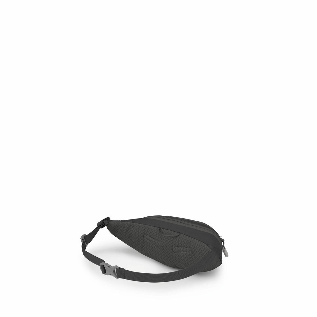 The image showcases a compact black sling bag, designed for easy wear around the waist or across the body. The bag features a textured pattern, adding a stylish element to its otherwise minimalist design. It has a zippered main compartment, and the adjust