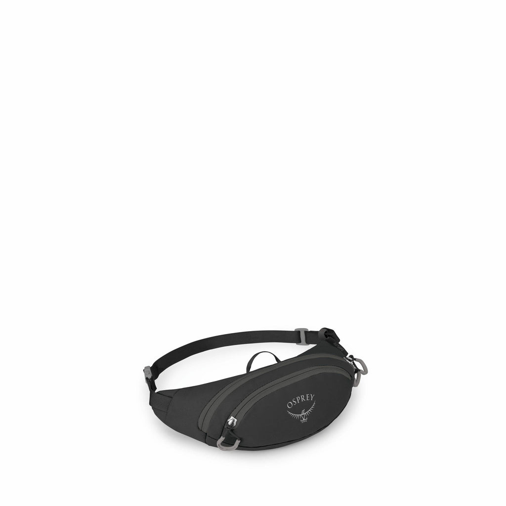 The image showcases a black Osprey waist pack, commonly known as a fanny pack, against a plain white background. The pack has a sleek and compact design with a curved, streamlined shape, featuring the Osprey logo prominently on the front. It has a central