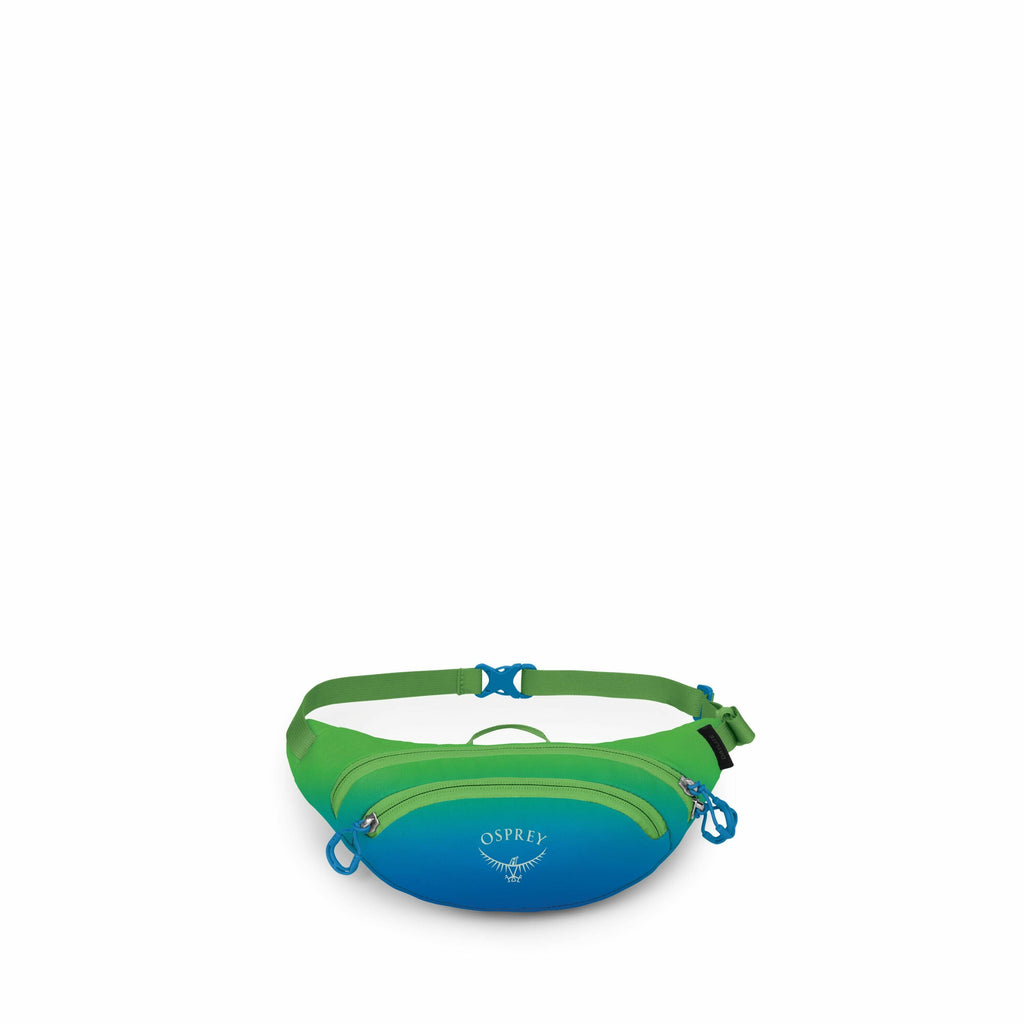 The image showcases an Osprey brand waist pack with a vibrant design. It features a two-tone color scheme of blue and green, with the brand's logo and emblem prominently displayed on the front in white. The pack has a sleek, curved shape with a zippered m