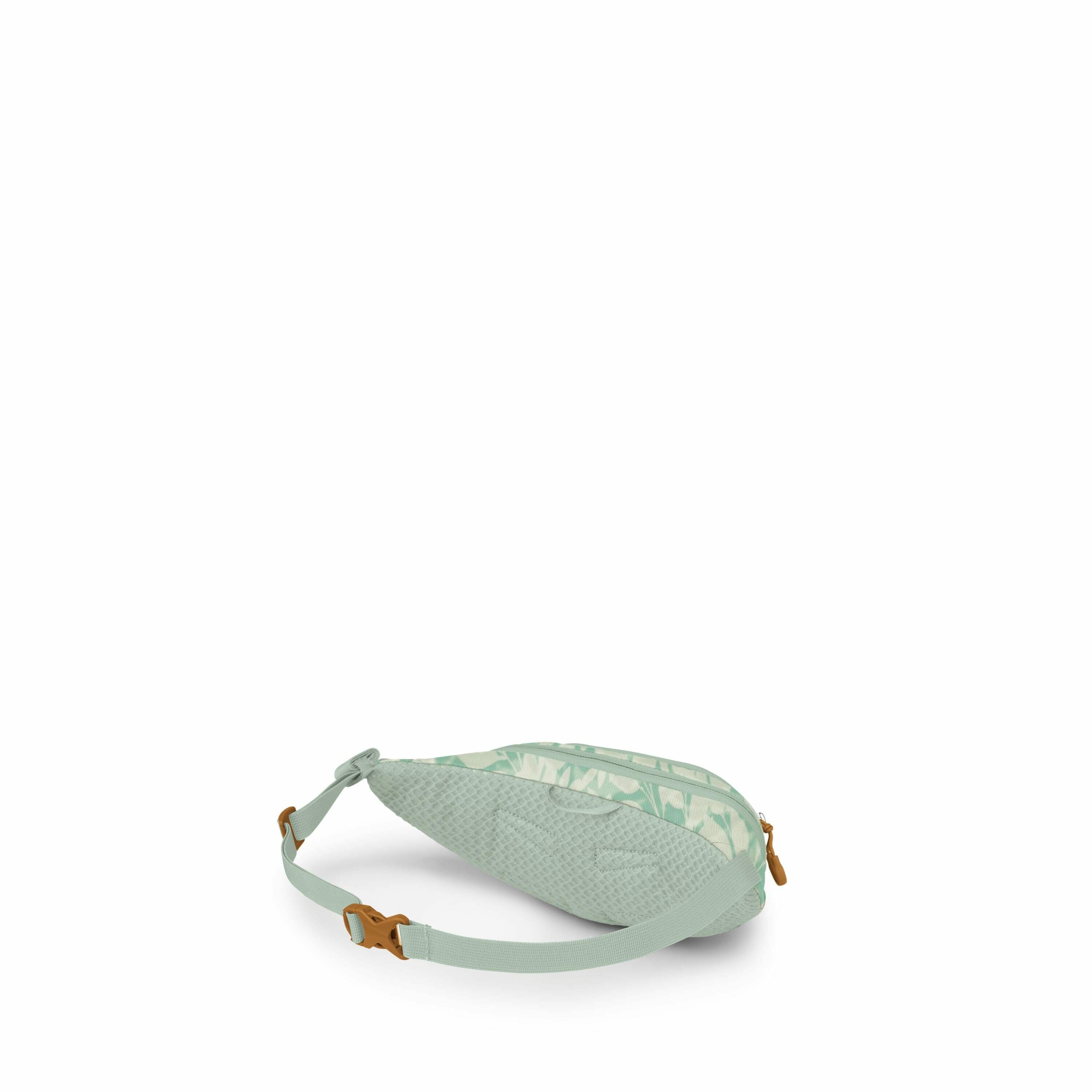 The image features a small, lightweight sling bag in a light green color with a subtle textured pattern and a leafy design. The bag is designed with an adjustable strap that includes a brown buckle for secure fastening. It appears to be compact and stylis