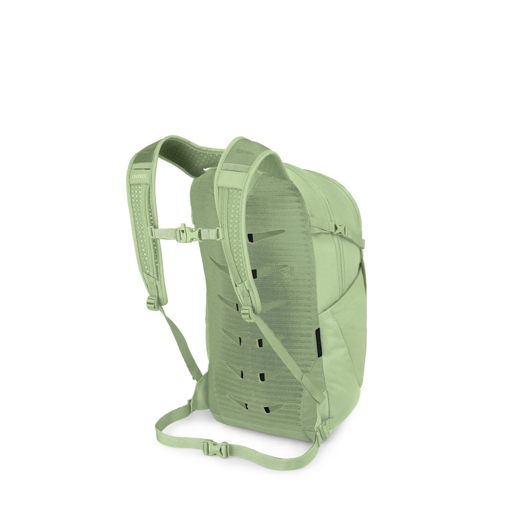 The image shows a light green backpack viewed from the back/side. It features padded shoulder straps with an adjustable sternum strap, a ventilated mesh back panel with cutout channels, and a thin hip/waist strap for stability. The pack has side compressi