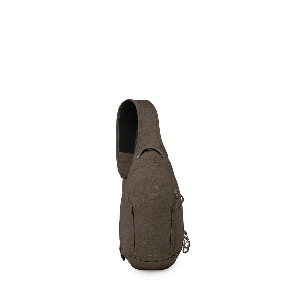 A compact, single-strap sling bag is shown against a white background. The pack is dark olive with a minimalist design and the Osprey logo subtly printed on the front. It features a rounded main compartment, a front zip pocket, and a side loop with attach