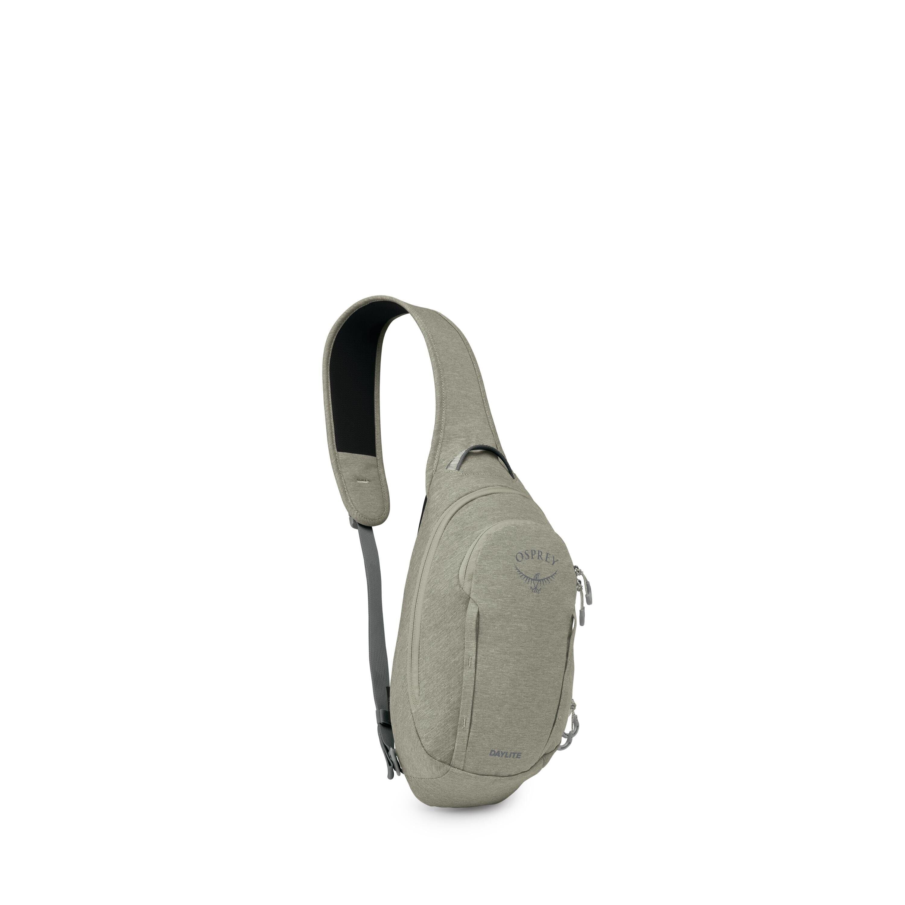 The image shows a compact, single-strap sling bag in a muted sage green color. It has a teardrop-shaped body with a padded shoulder strap, side-release buckle, and multiple zippered compartments. The front features the Osprey logo and a small "Daylite" la