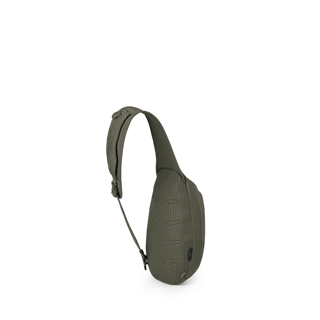 The image shows a compact, single-strap sling bag in an olive green color. It has a teardrop-shaped body with a textured, grid-like fabric and a padded, adjustable shoulder strap featuring a buckle and small metal loop. The bag appears streamlined and min