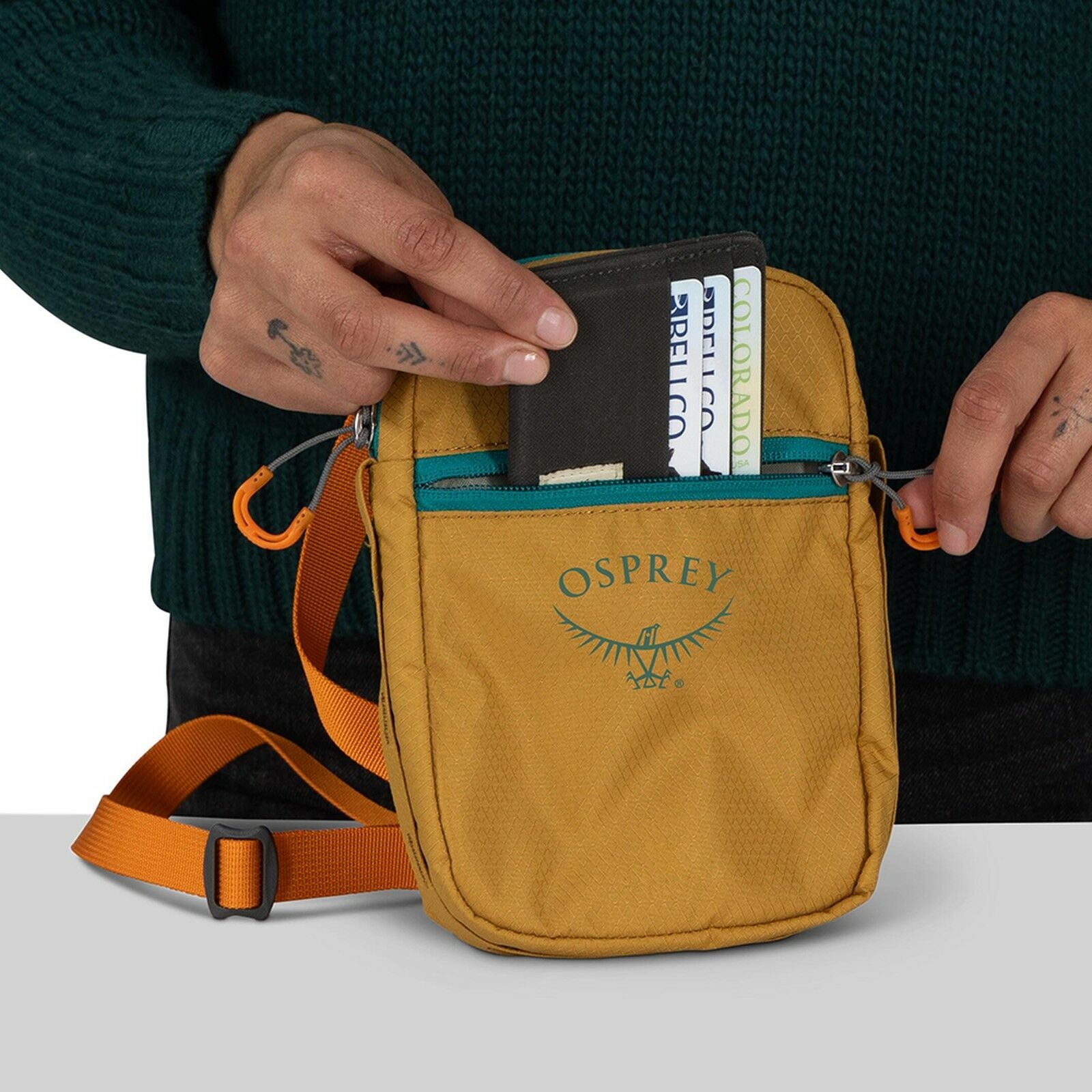 detail view of the Daylite Small Crossbody in Tumbleweed Yellow/Tunnel Vision