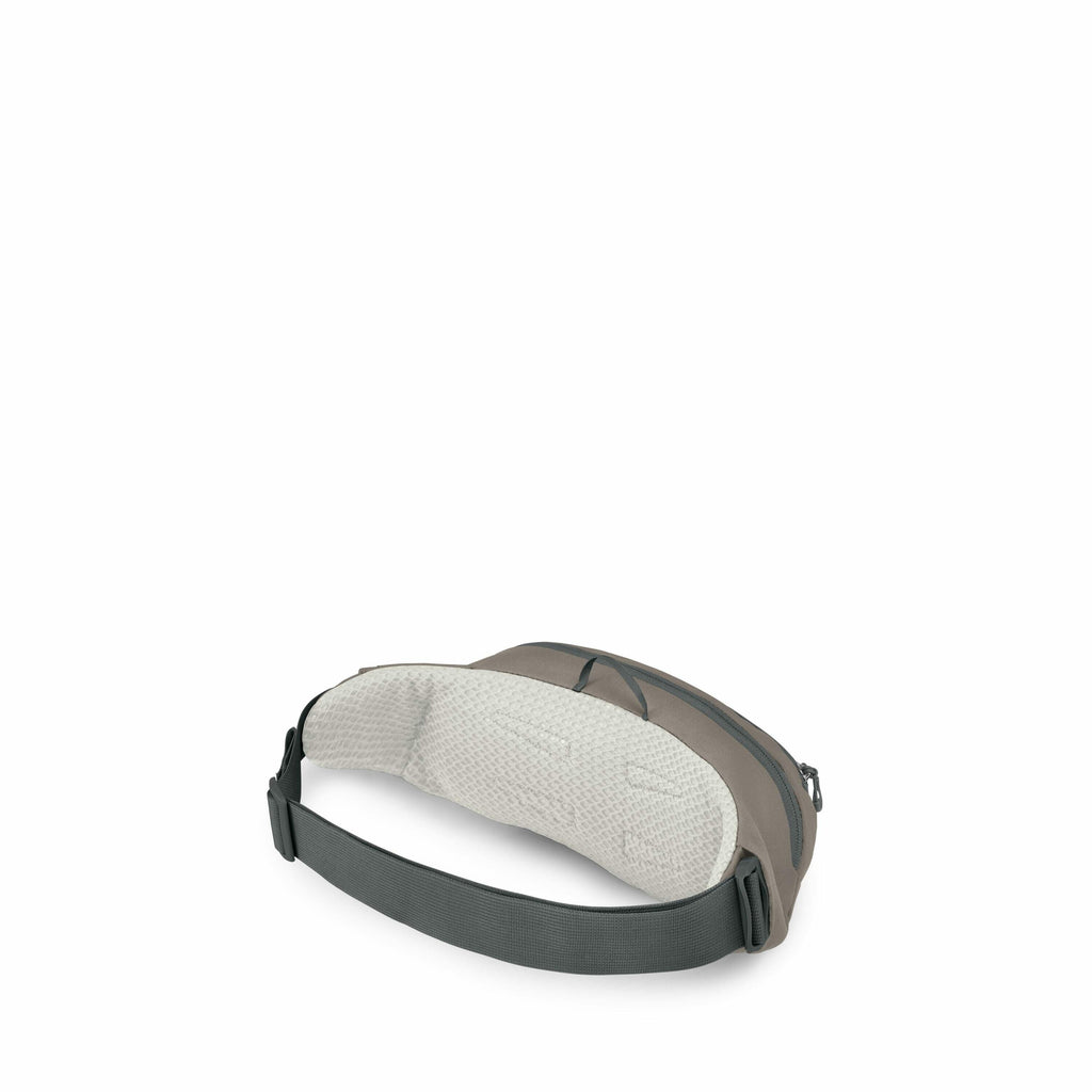 The image shows a small gray fabric bag with a single adjustable strap. The bag features a textured back pad for comfort and appears to be designed for carrying essentials. It has a zipper closure on the top, providing access to the interior of the bag. T