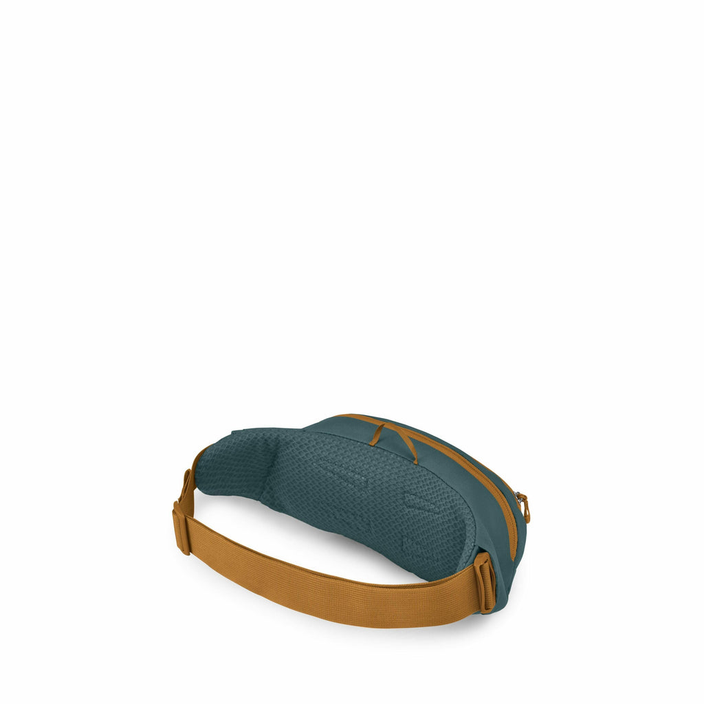 The image showcases a compact, stylish fanny pack from multiple angles, highlighting its various features. The main body of the bag is a dark teal color with an earthy brown adjustable strap, offering a contrast that makes the design stand out. The pack h