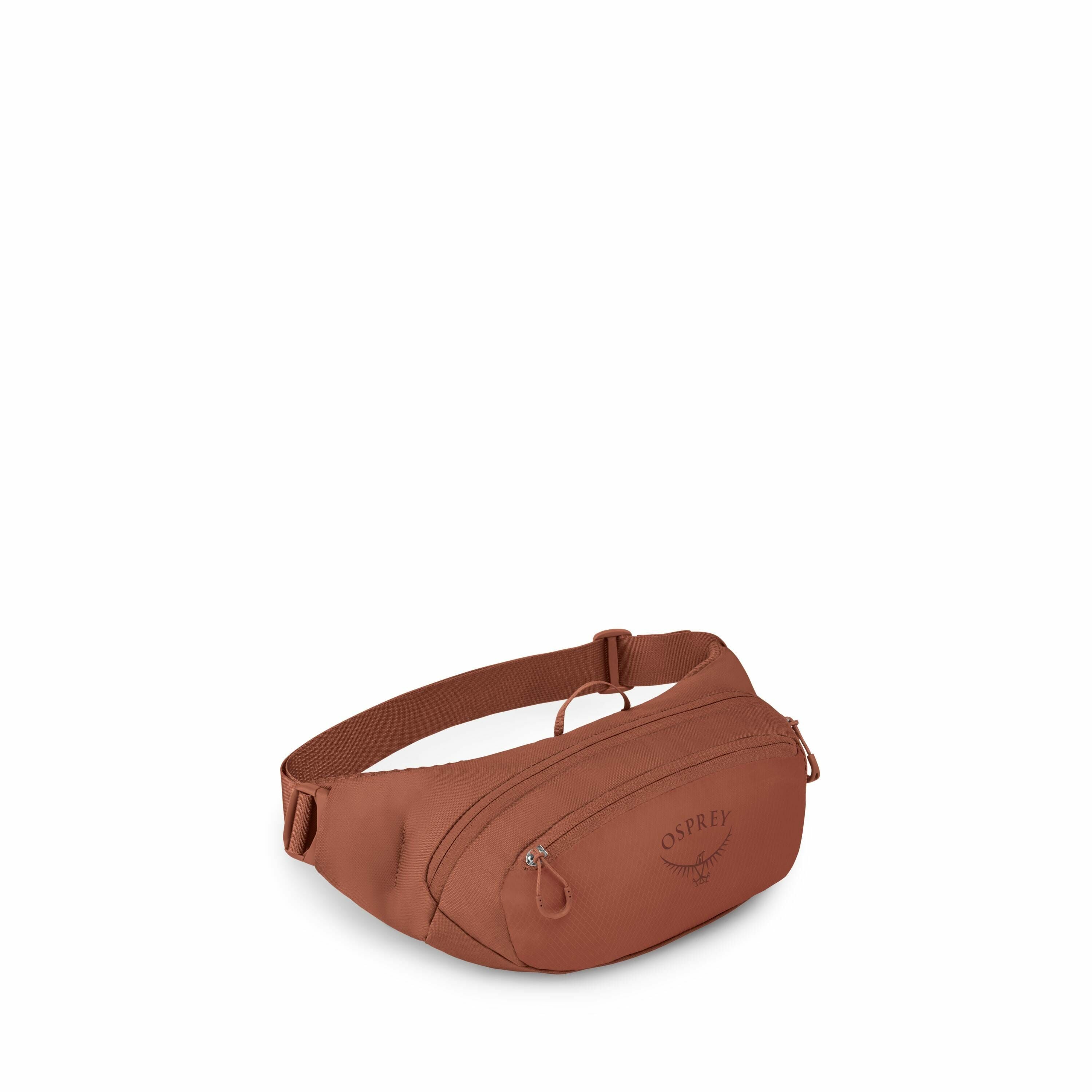 The image features an Osprey waist pack, often referred to as a fanny pack or belt bag, in a reddish-brown color. The bag is compact and designed to be worn around the waist, with an adjustable strap and a buckle for fastening. It has two visible zippered