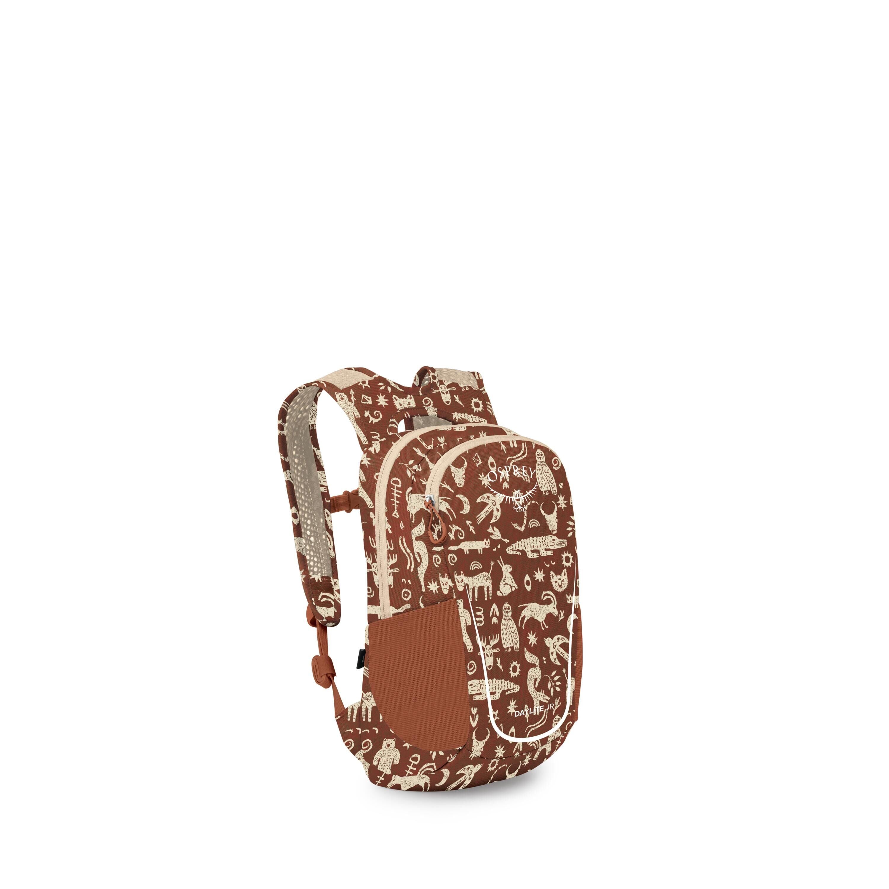 A small backpack is shown from a front three-quarter view, highlighting its straps. The bag is primarily rust-brown with beige accents and a playful cream-colored pattern featuring animals and shapes along the straps and sides. It has adjustable shoulder