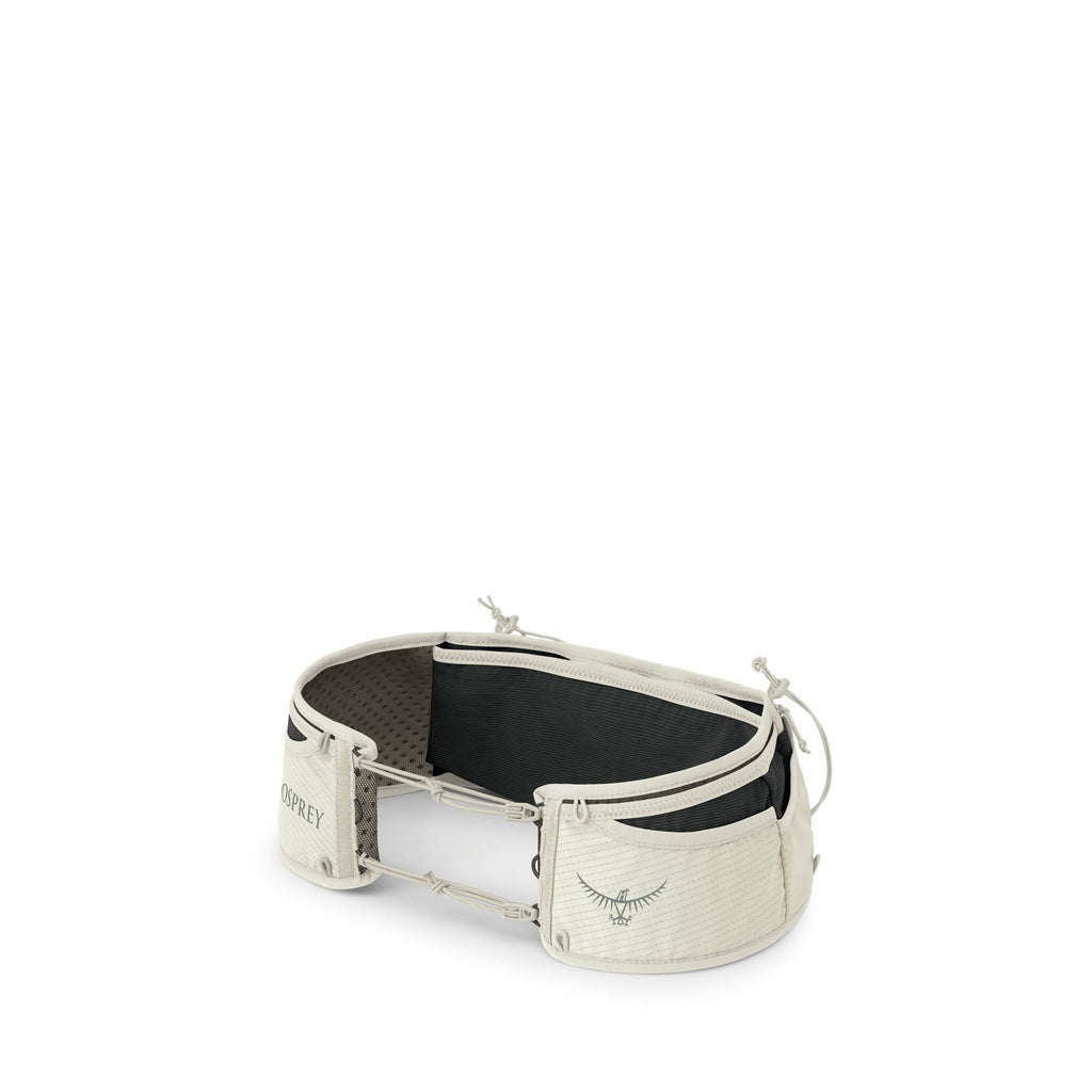 The image displays a light gray harness or waist belt with a black inner lining, designed by the brand Osprey. It features an Osprey logo on one of the side pockets and the brand name on the opposite side. The belt appears to have multiple adjustment poin