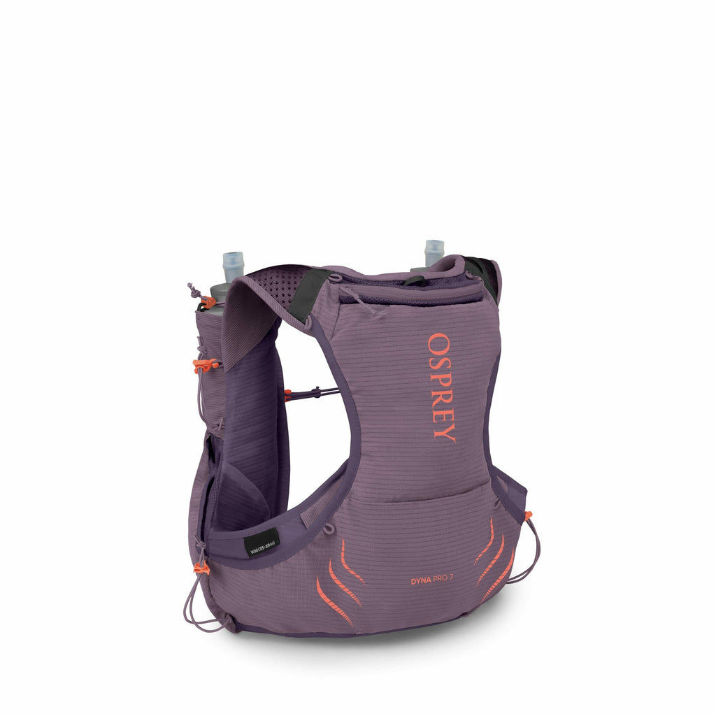 The image displays a purple Osprey running vest or backpack, designed for activities like running or hiking. The vest features multiple compartments and a snug-fitting design, indicated by adjustable straps and visible pockets. Two water bottles with blue