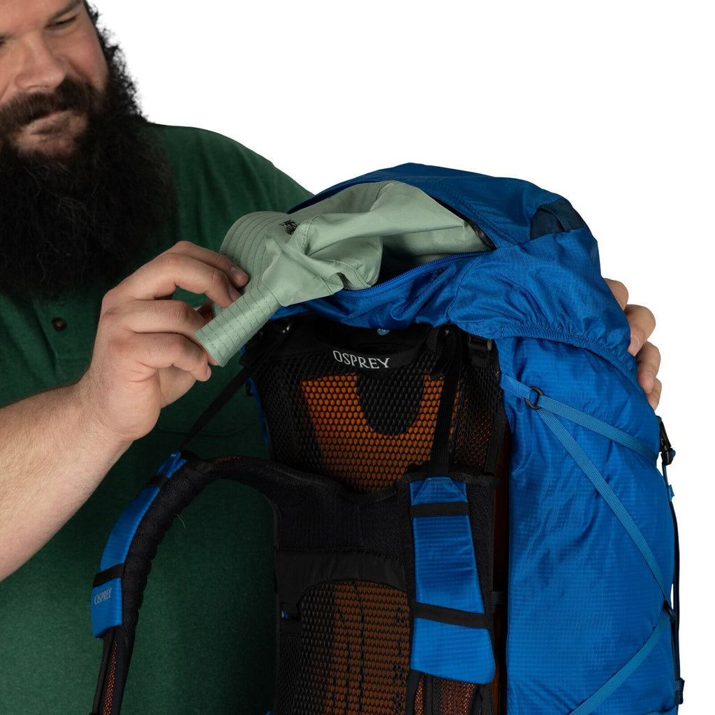 model wearing the EXOS 58 Extended Fit in color Blue Ribbon