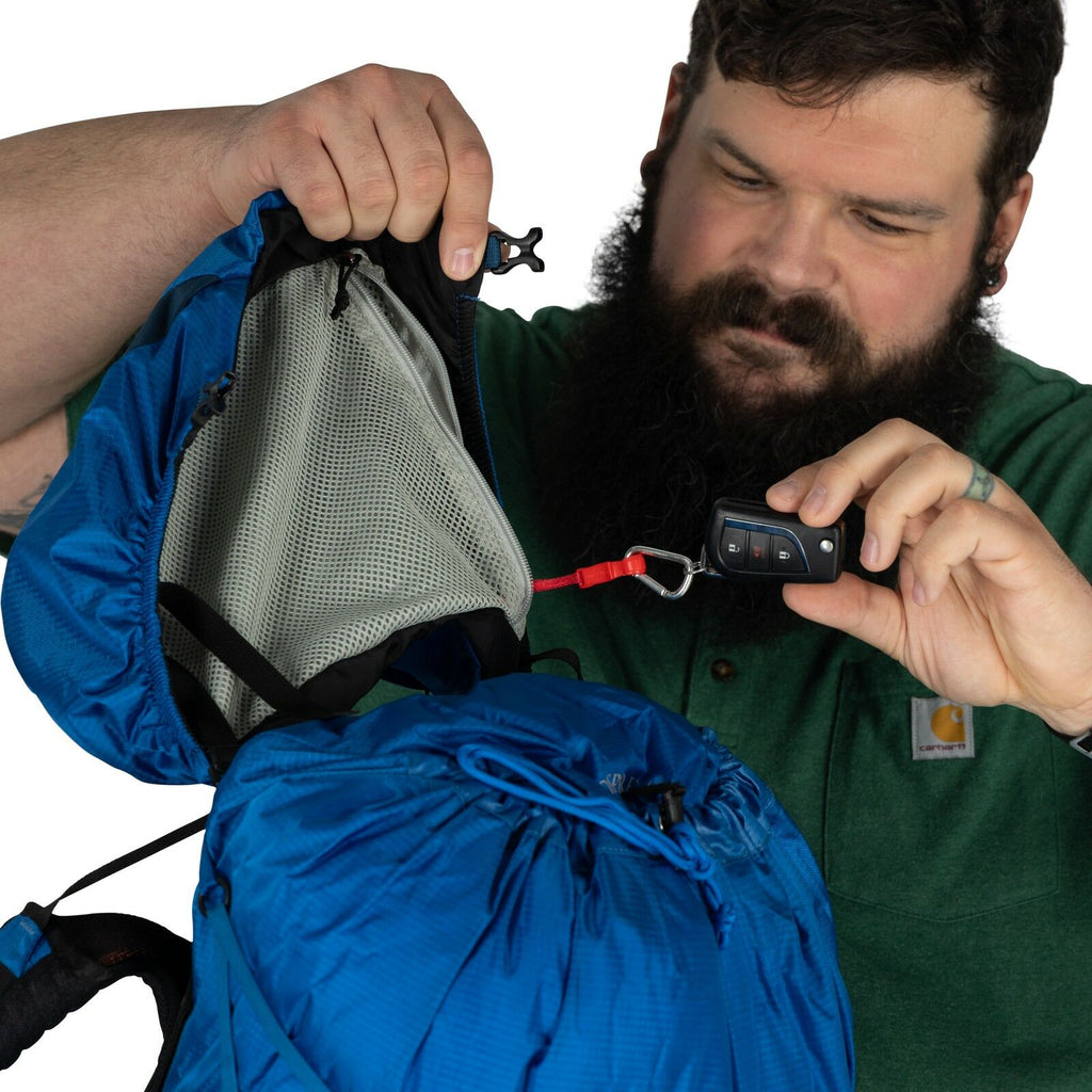model wearing the EXOS 58 Extended Fit in color Blue Ribbon