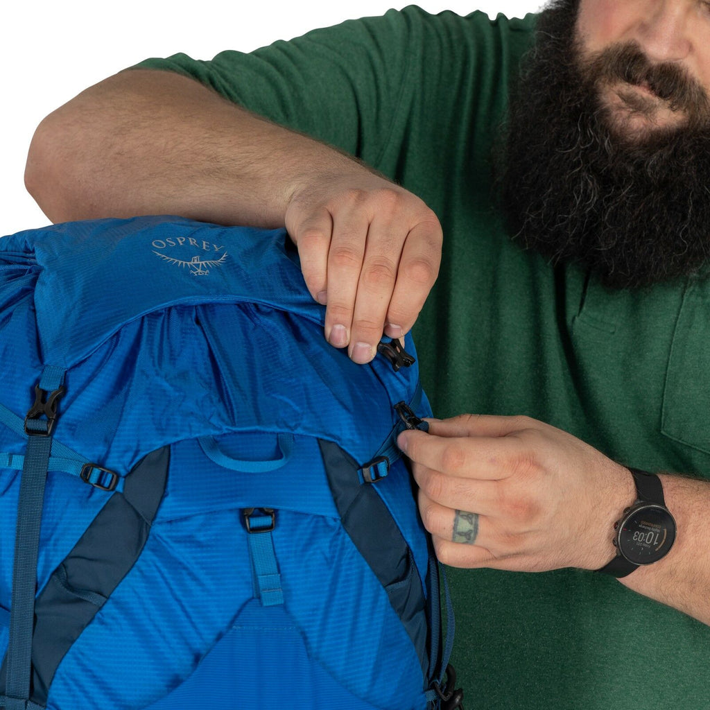 model wearing the EXOS 58 Extended Fit in color Blue Ribbon