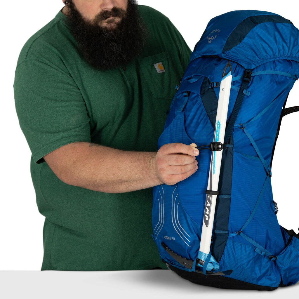 model wearing the EXOS 58 Extended Fit in color Blue Ribbon