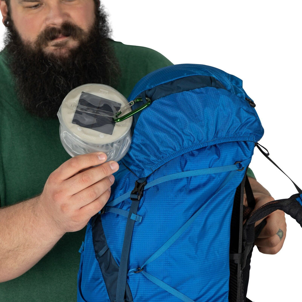 model wearing the EXOS 58 Extended Fit in color Blue Ribbon