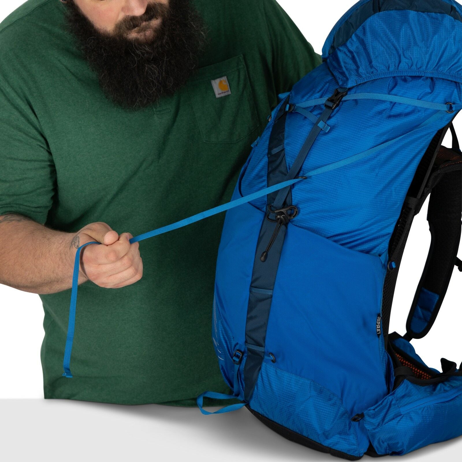 model wearing the EXOS 58 Extended Fit in color Blue Ribbon