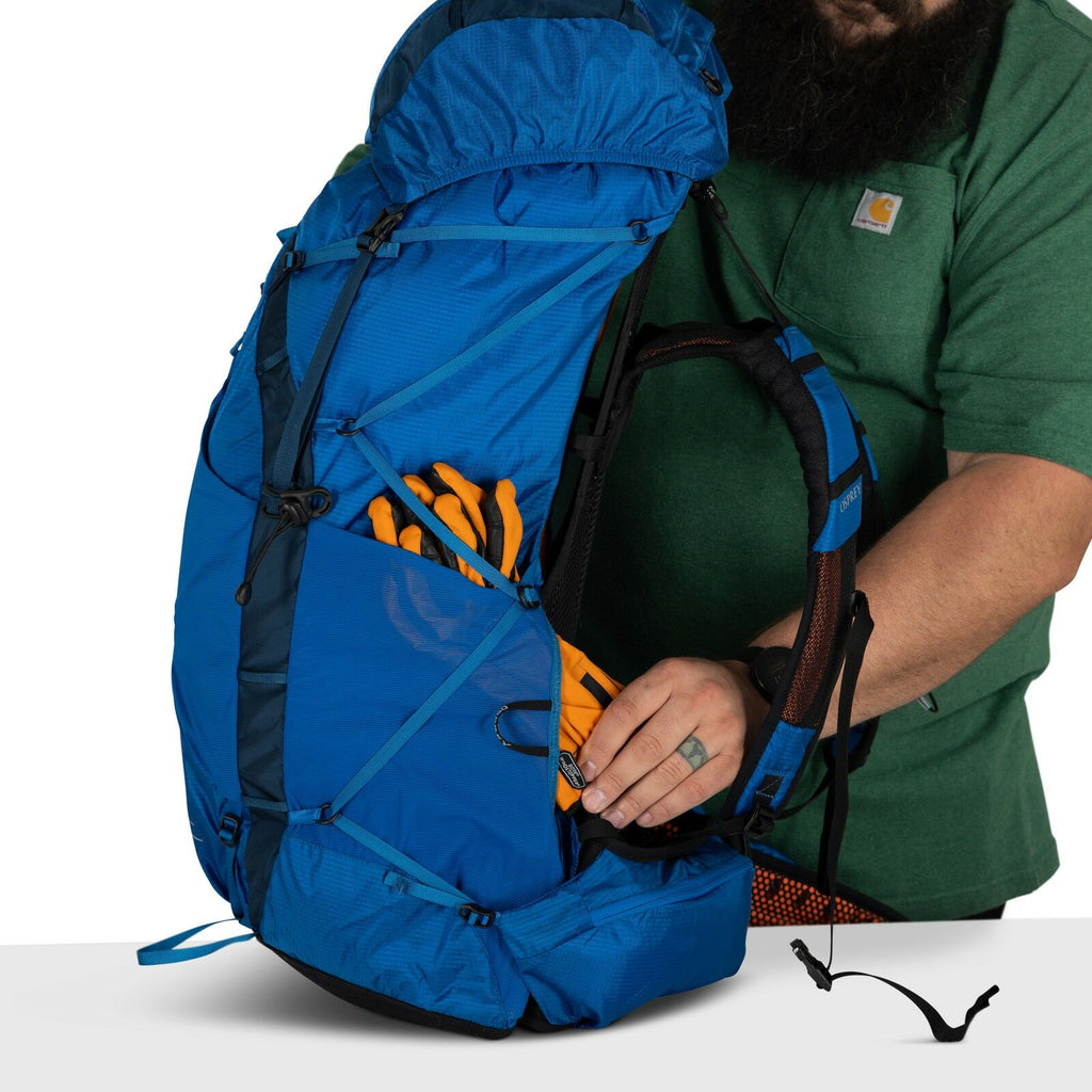 model wearing the EXOS 58 Extended Fit in color Blue Ribbon