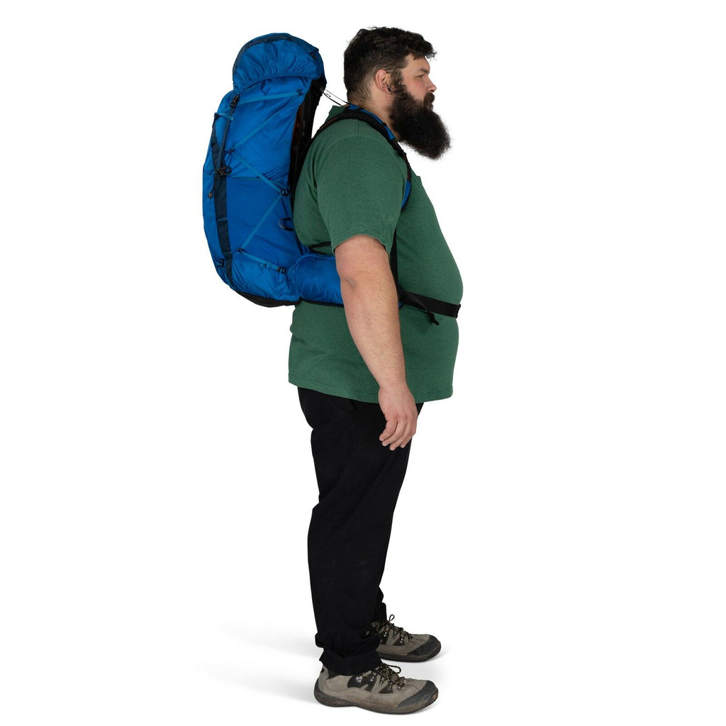 model wearing the EXOS 58 Extended Fit in color Blue Ribbon