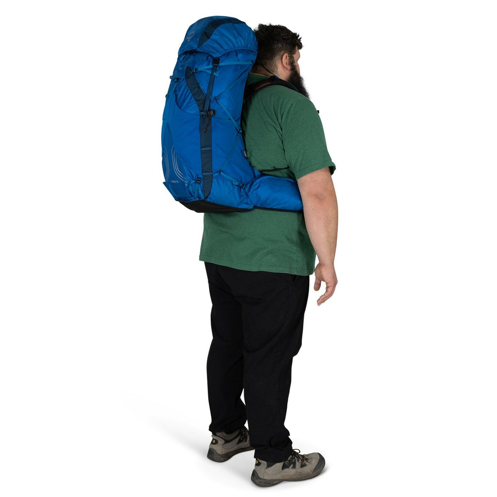 model wearing the EXOS 58 Extended Fit in color Blue Ribbon