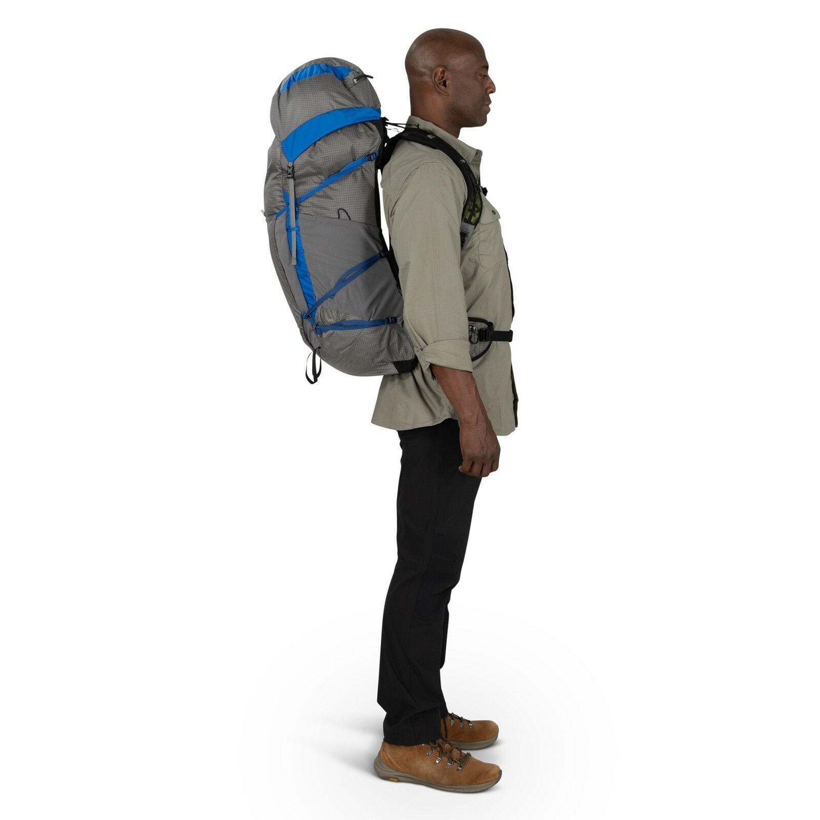 a person modeling the Exos Pro 55 in color dalegreyagamblue