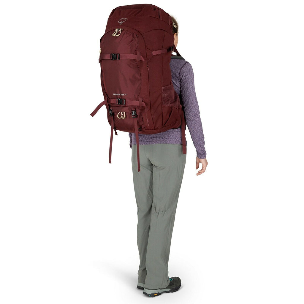 a person modeling the Fairview® Trek 70 in color Night Jungle Blue