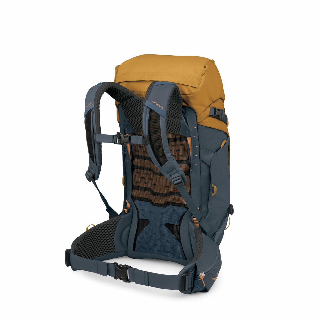 The image displays a two-toned hiking backpack designed for outdoor activities. It features a mustard yellow top section, with the main body in a contrasting blue color. The backpack is equipped with ergonomic shoulder straps and a supportive back panel,