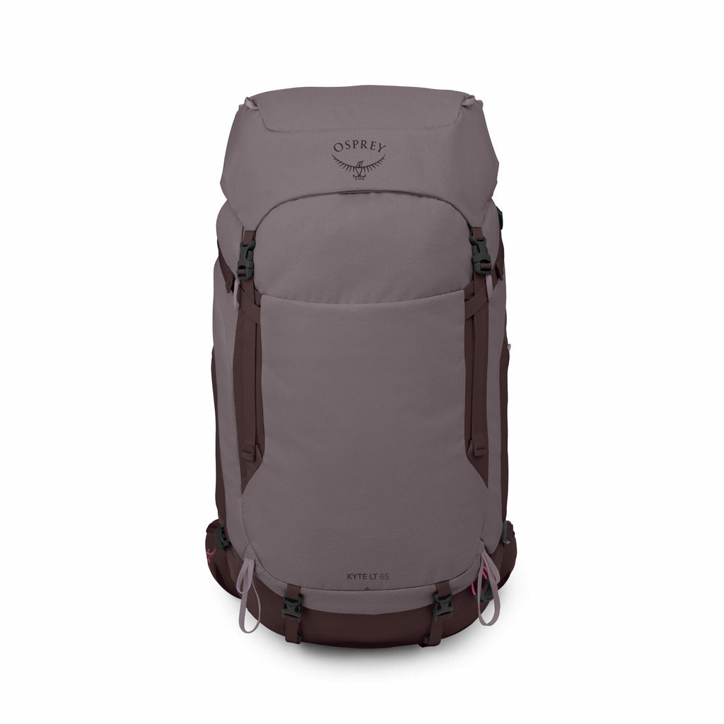 The image features an Osprey Kyte LT 65 backpack in a muted purple-gray color with darker brown accents. It has a sleek, cylindrical design with a top lid and multiple attachment points for gear. The Osprey logo, which resembles an outstretched bird, is p