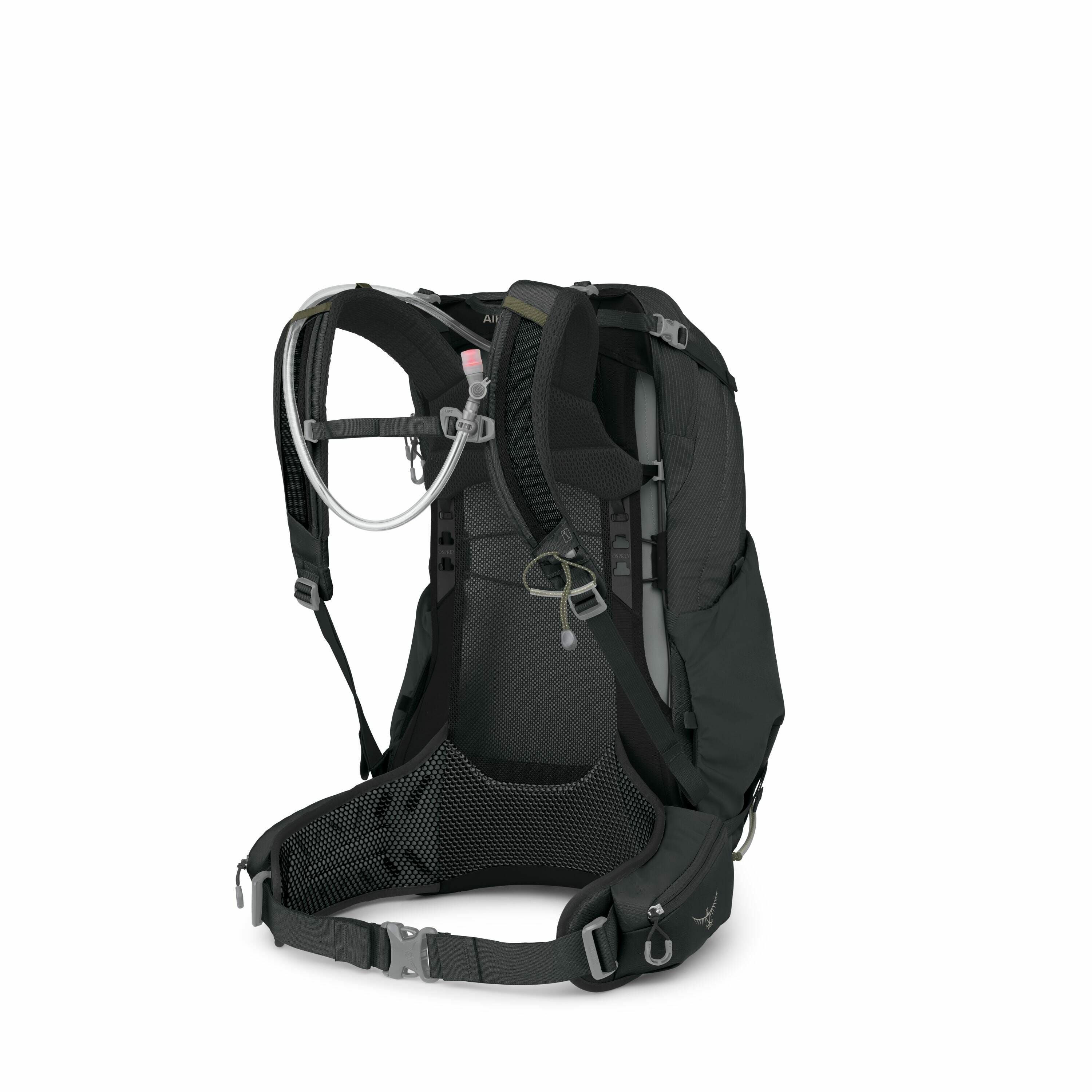 The image features a high-performance black hiking or backpacking backpack, viewed from the side that would rest against the wearer's back. It is equipped with a hydration system, as indicated by the tube with a pink nozzle attached to one of the shoulder